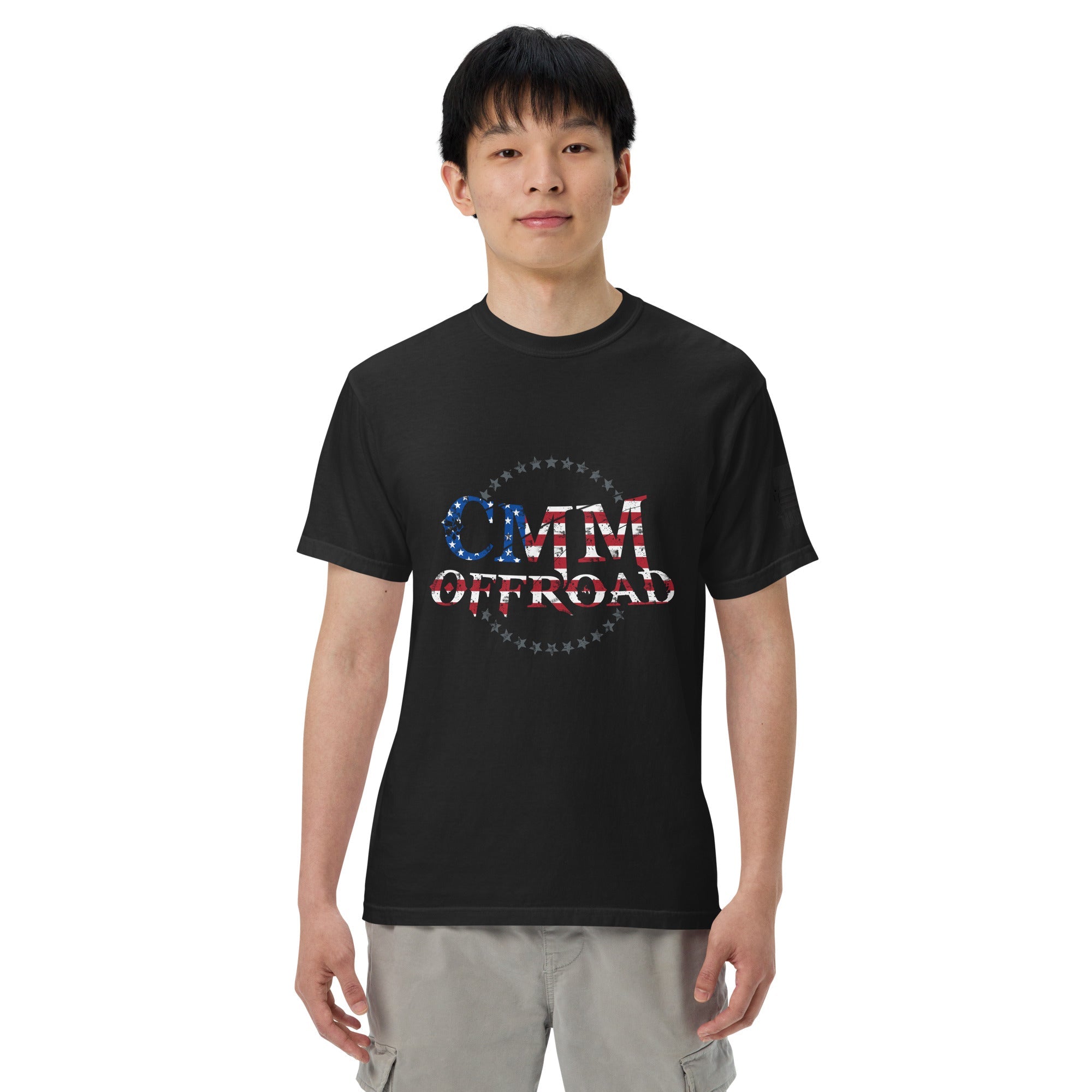 Unisex black heavyweight t-shirt with CMM Offroad American flag logo, front view