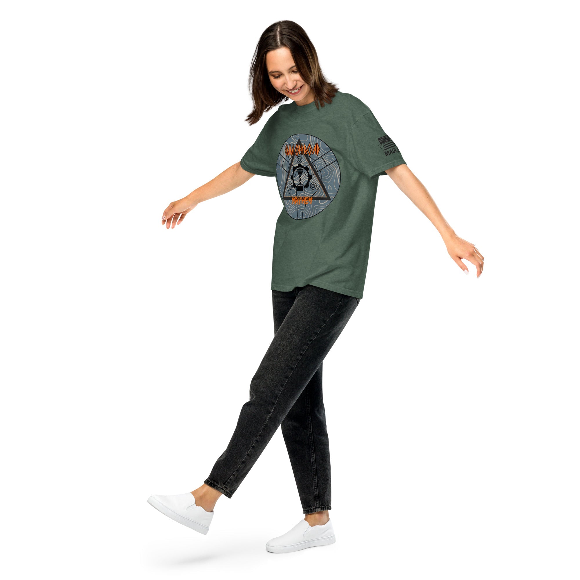 Woman wearing blue spruce unisex heavyweight t-shirt with outdoor adventure graphic