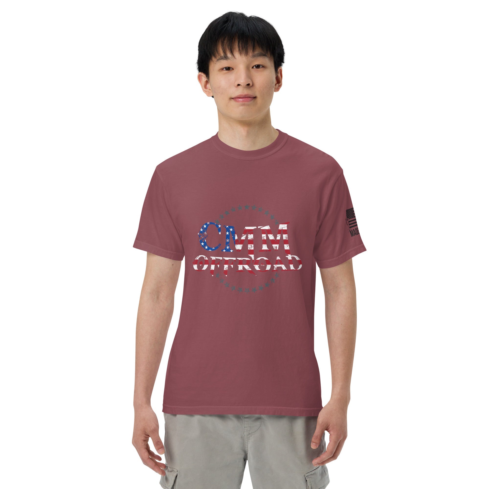 Unisex brick red heavyweight t-shirt with CMM Offroad American flag logo, front view
