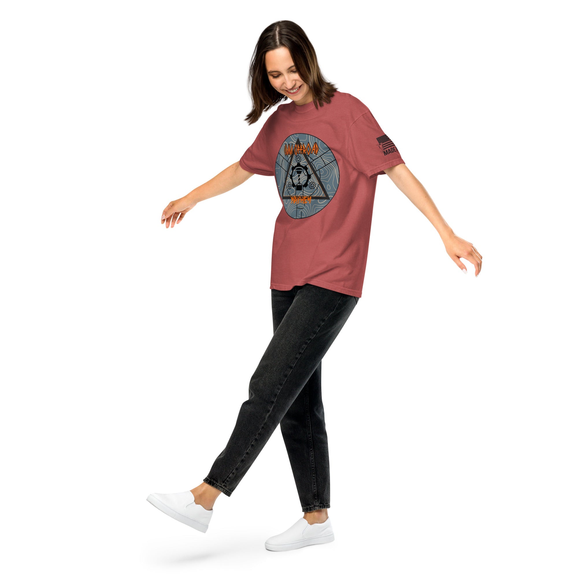 Woman wearing crimson unisex graphic t-shirt with adventure-themed front design