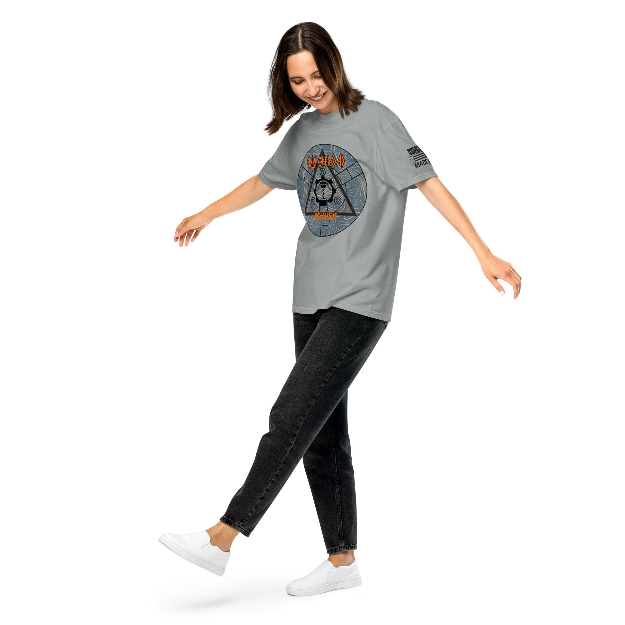 Woman wearing granite gray unisex heavyweight t-shirt with adventure-inspired graphic print
