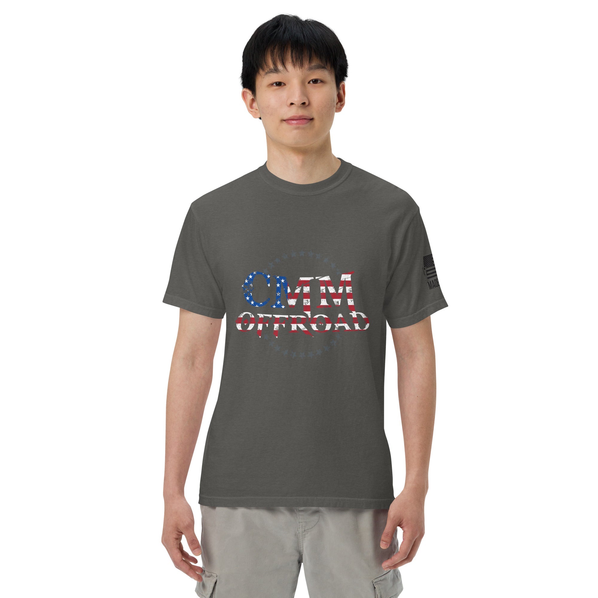 Unisex pepper-colored heavyweight t-shirt with CMM Offroad American flag logo, front view.