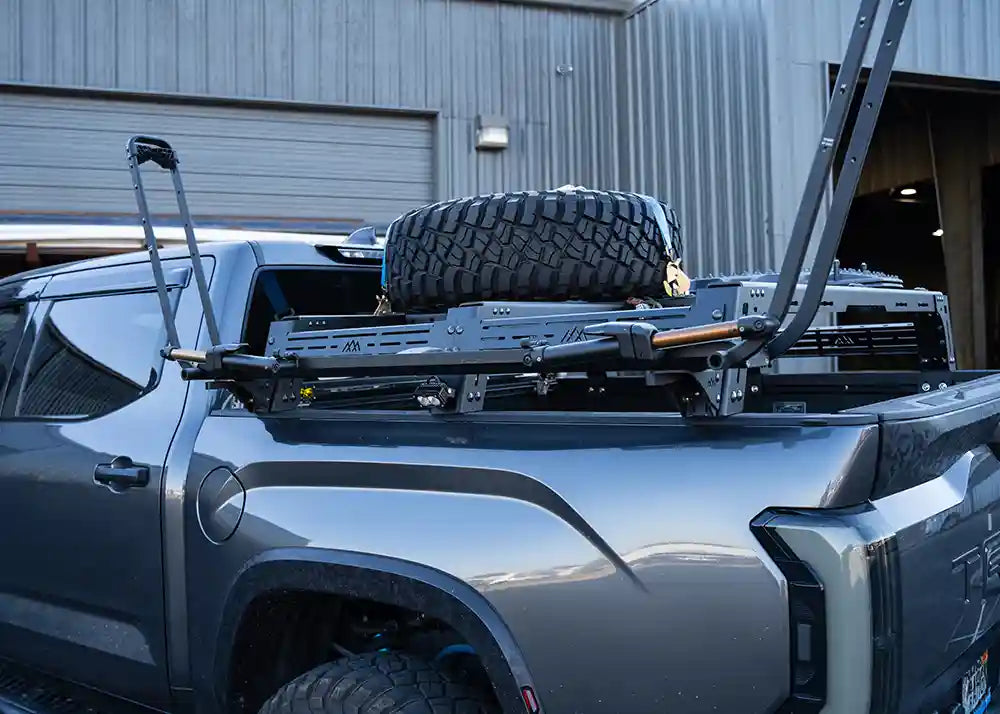 universal-truck-bed-rack-bike-tray-mounts-installed - NVMOS