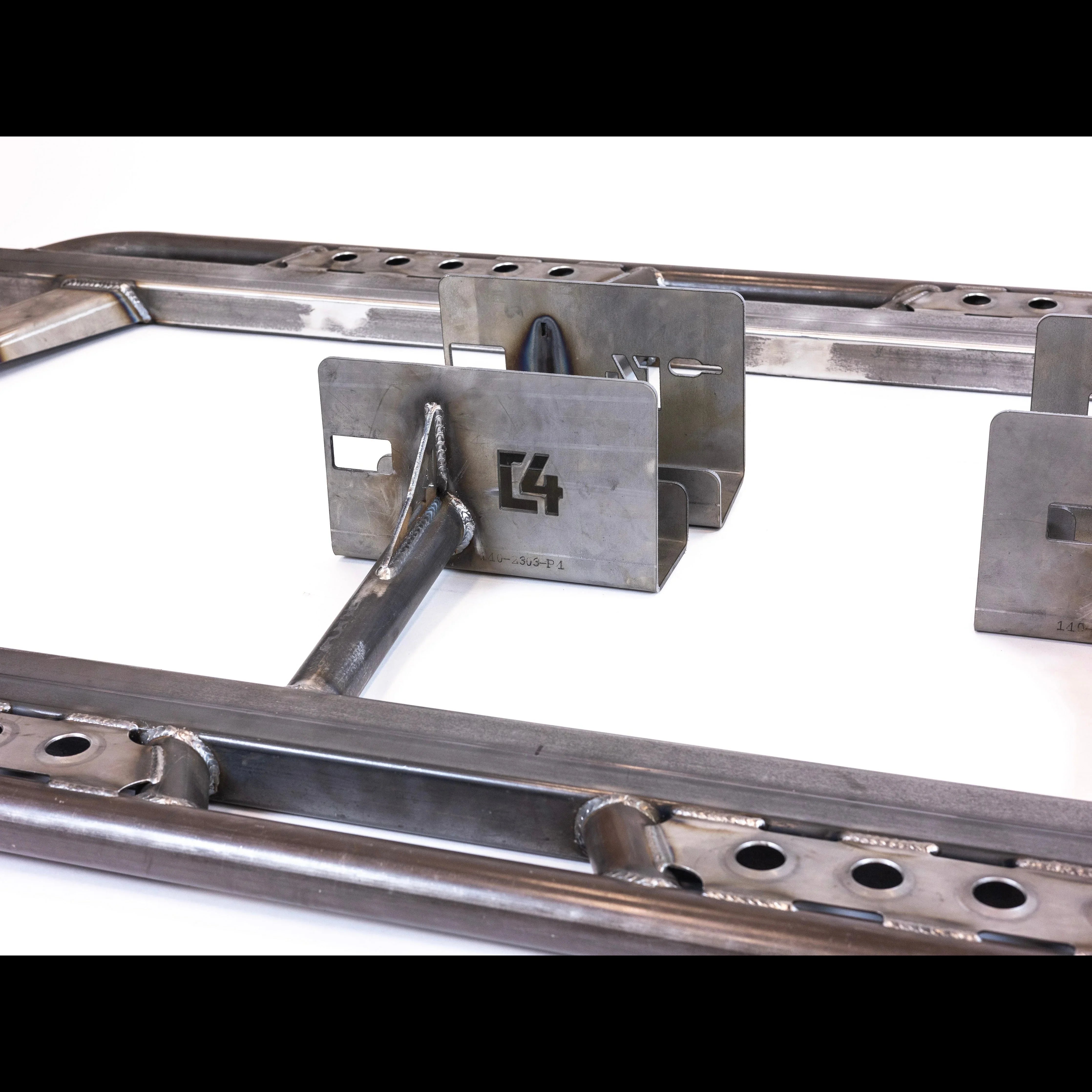Heavy-duty steel rock slider frame with welded brackets for off-road vehicle protection