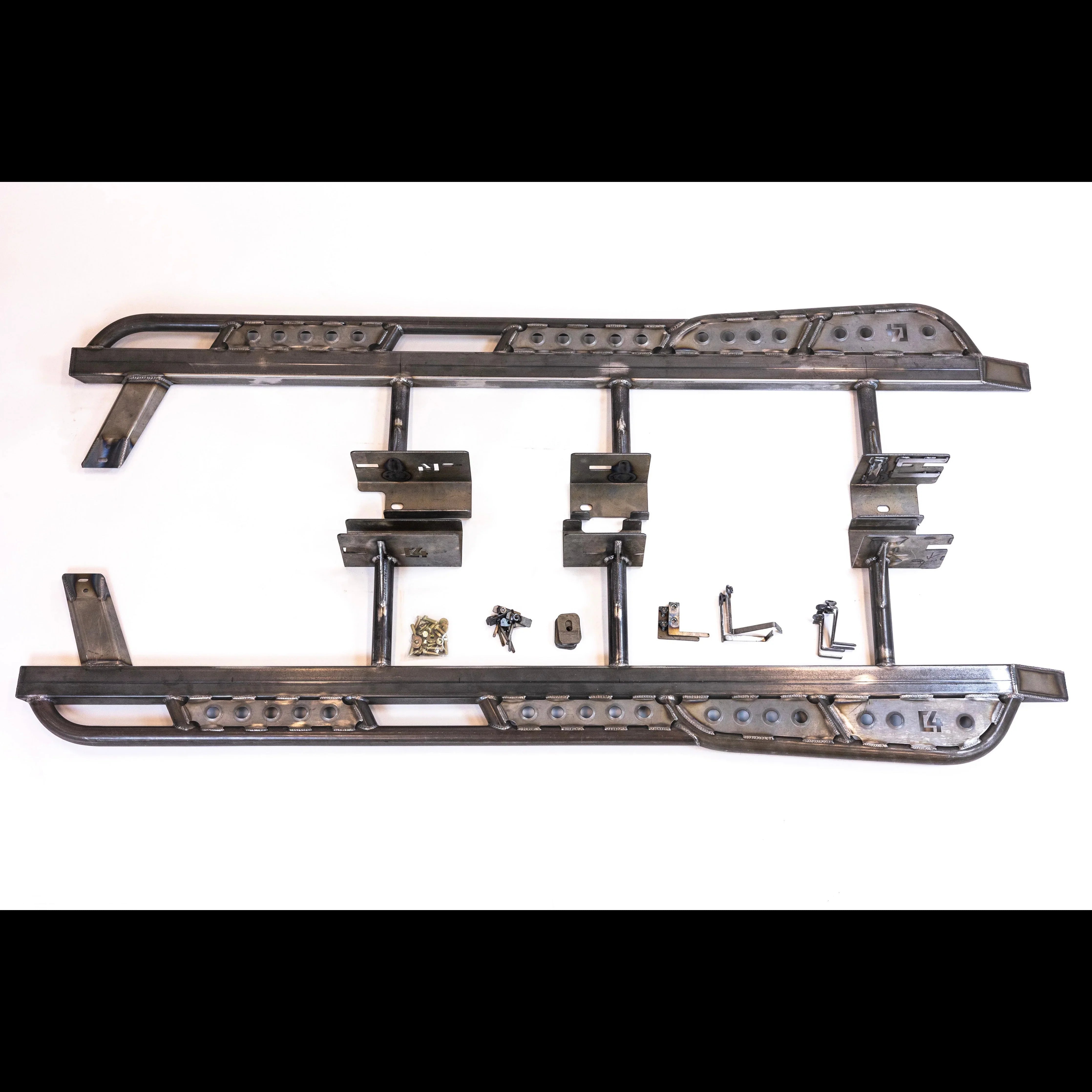 Steel rock sliders and mounting hardware for off-road vehicle on white background