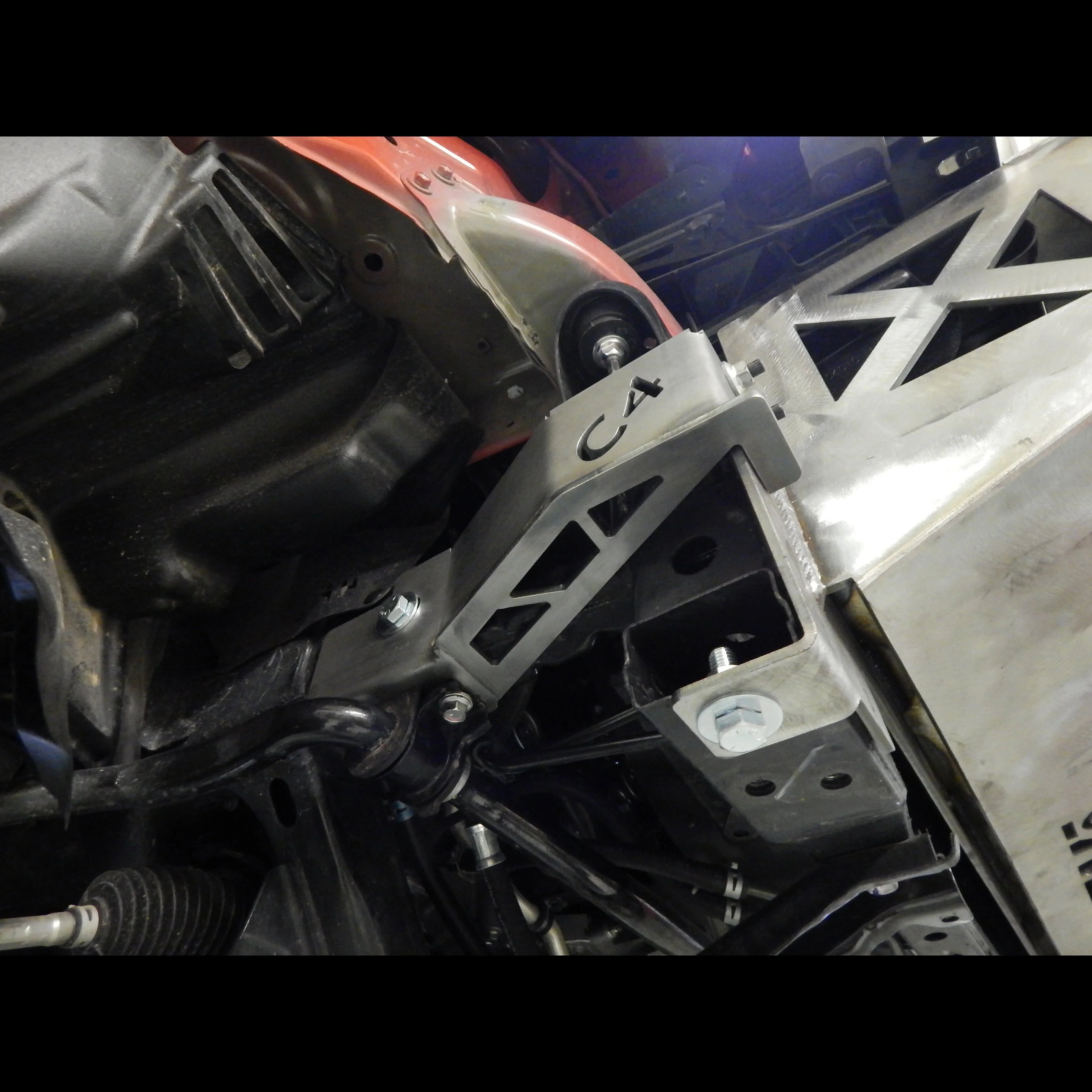 3rd gen Tacoma front bumper frame support brackets installed under vehicle