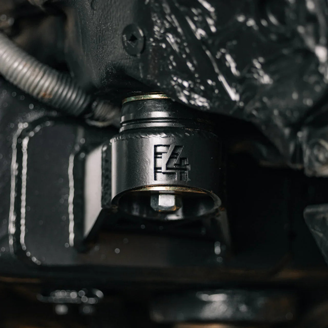 Close-up of heavy-duty metal suspension component for off-road vehicle fitment