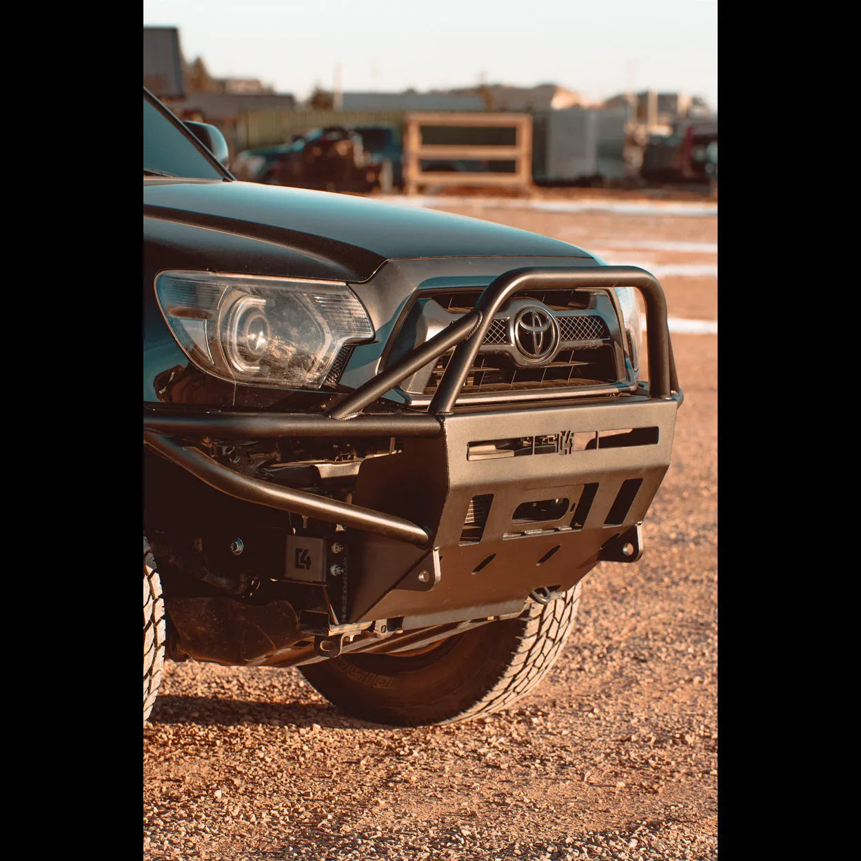 Toyota 4Runner with heavy-duty off-road front bumper on gravel for overlanding