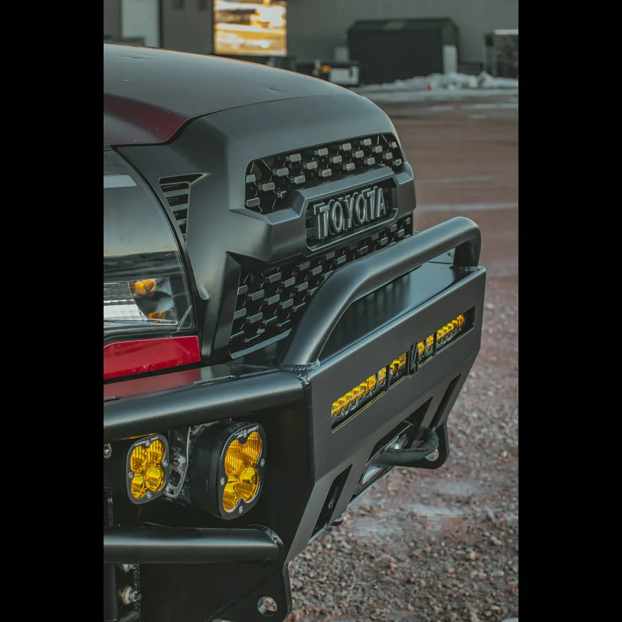 Toyota Tacoma front grille and heavy-duty off-road bumper with yellow LED fog lights