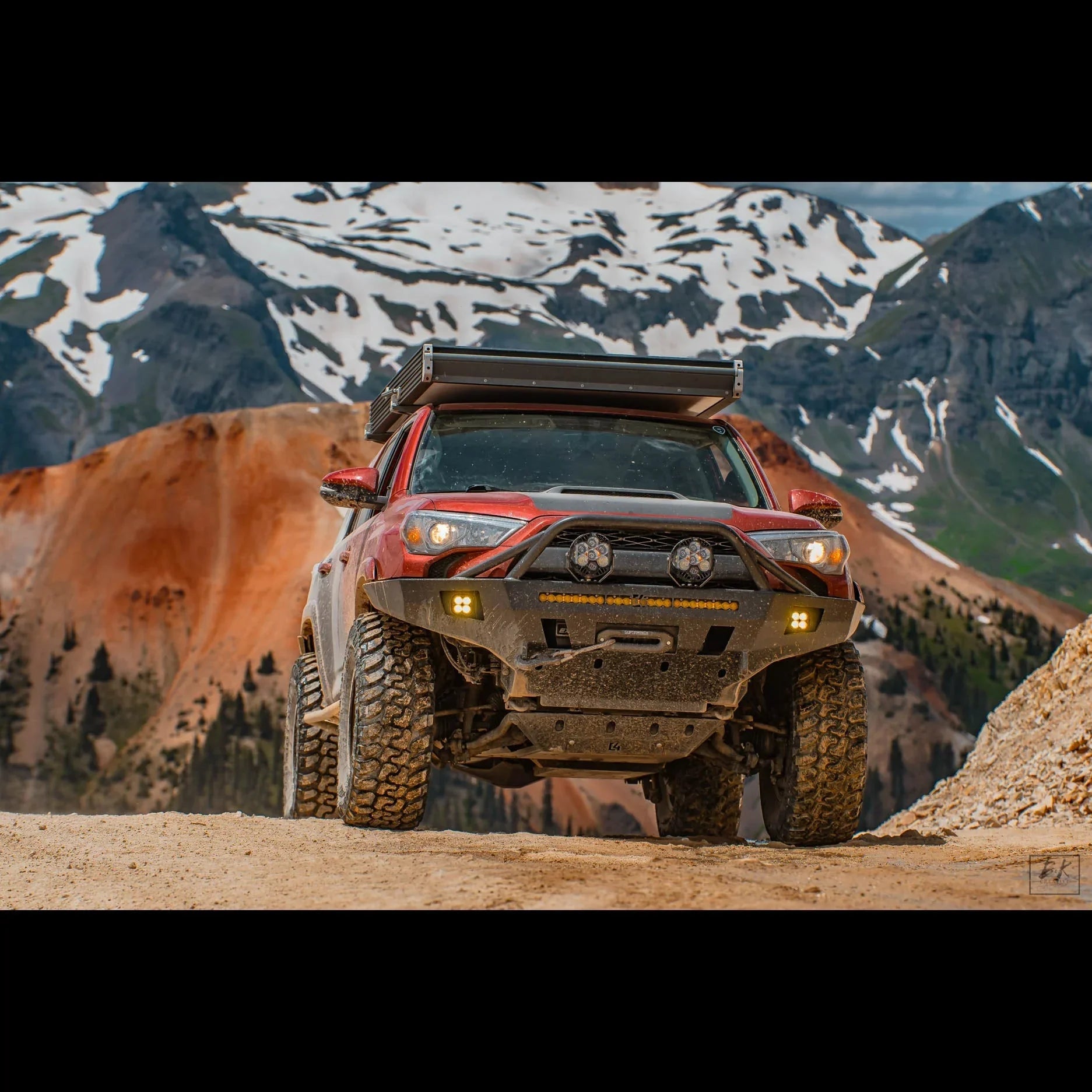 Toyota 4Runner with off-road front bumper on mountain trail, overlanding setup