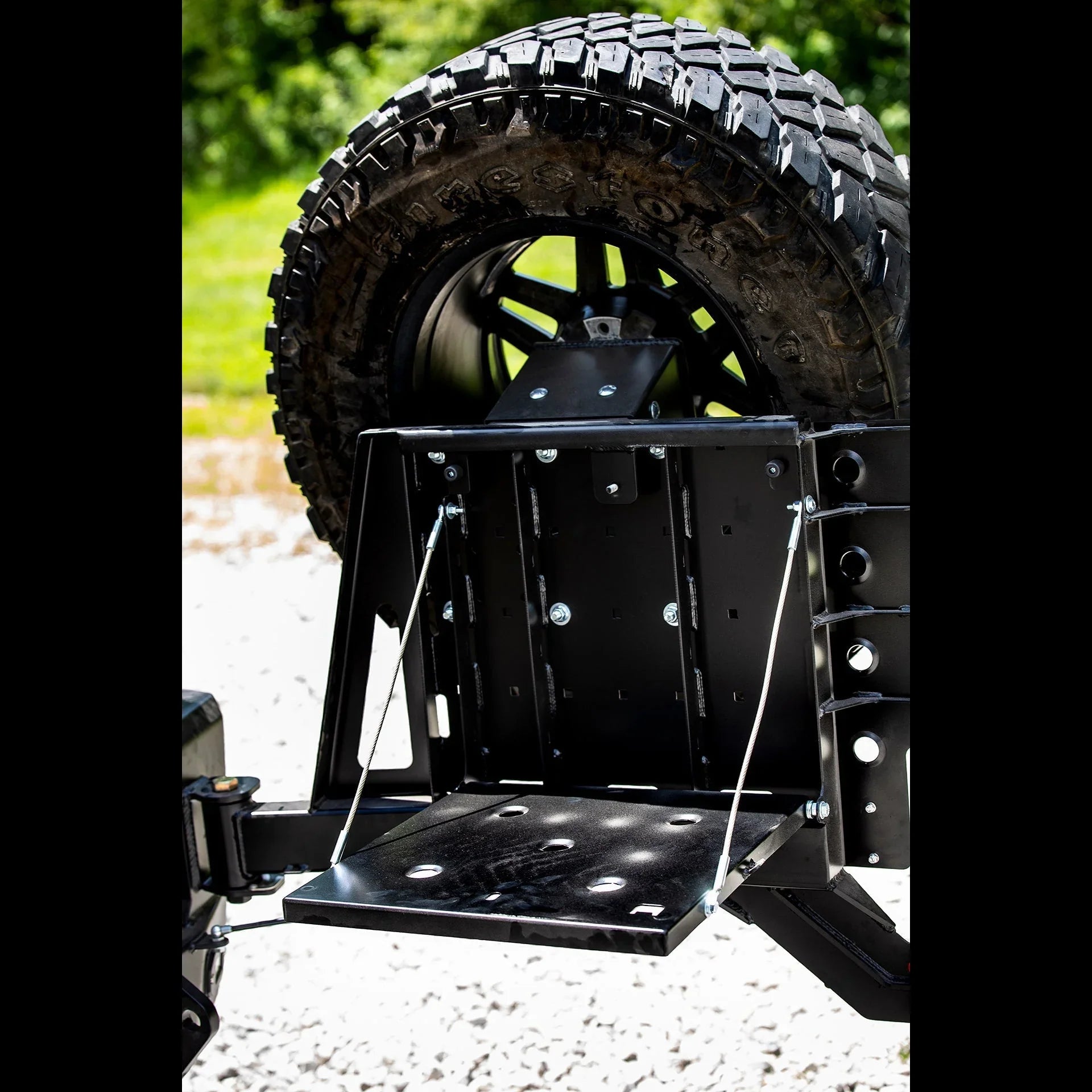 Toyota 4Runner rear overland bumper with mounted spare tire carrier outdoors