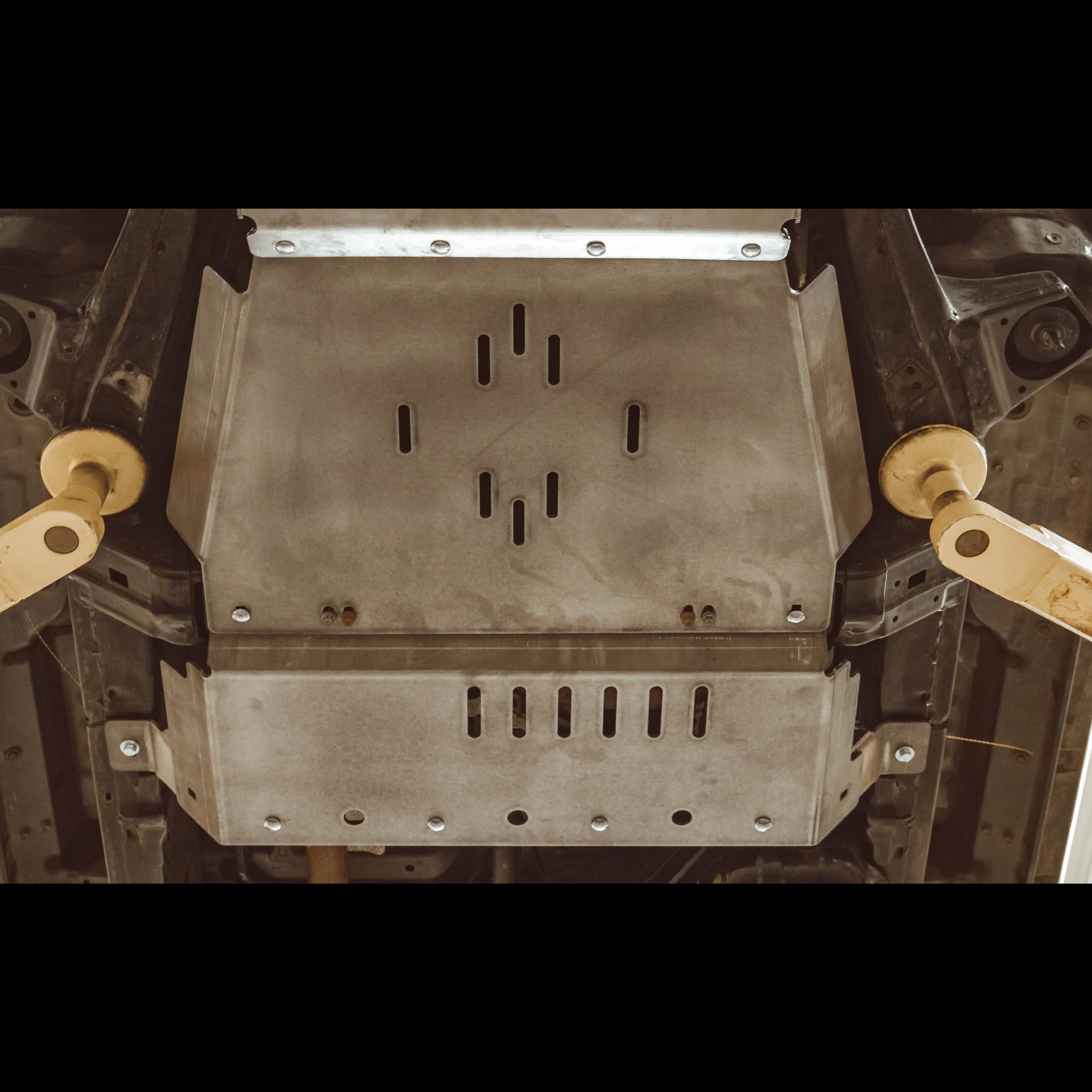 Rear skid plates installed under a Toyota 4Runner for off-road protection