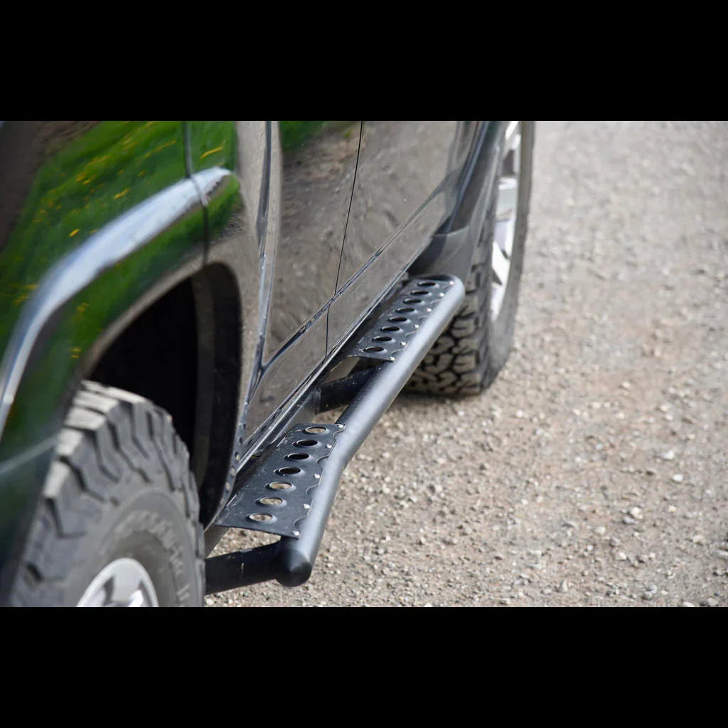 Toyota 4Runner 5th Gen rock sliders installed, black steel step, off-road ready
