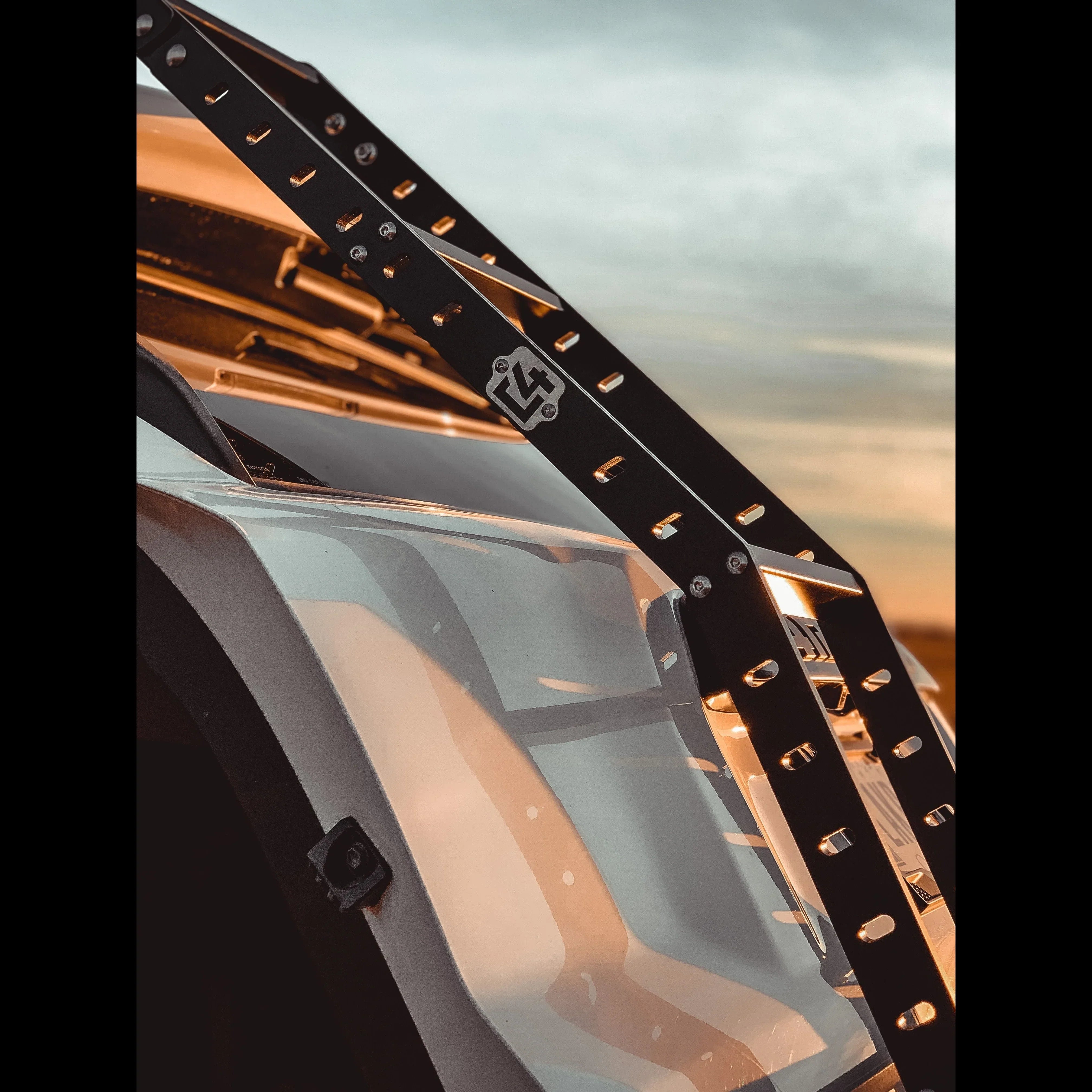 Black hatch ladder mounted on 5th Gen Toyota 4Runner for overlanding at sunset