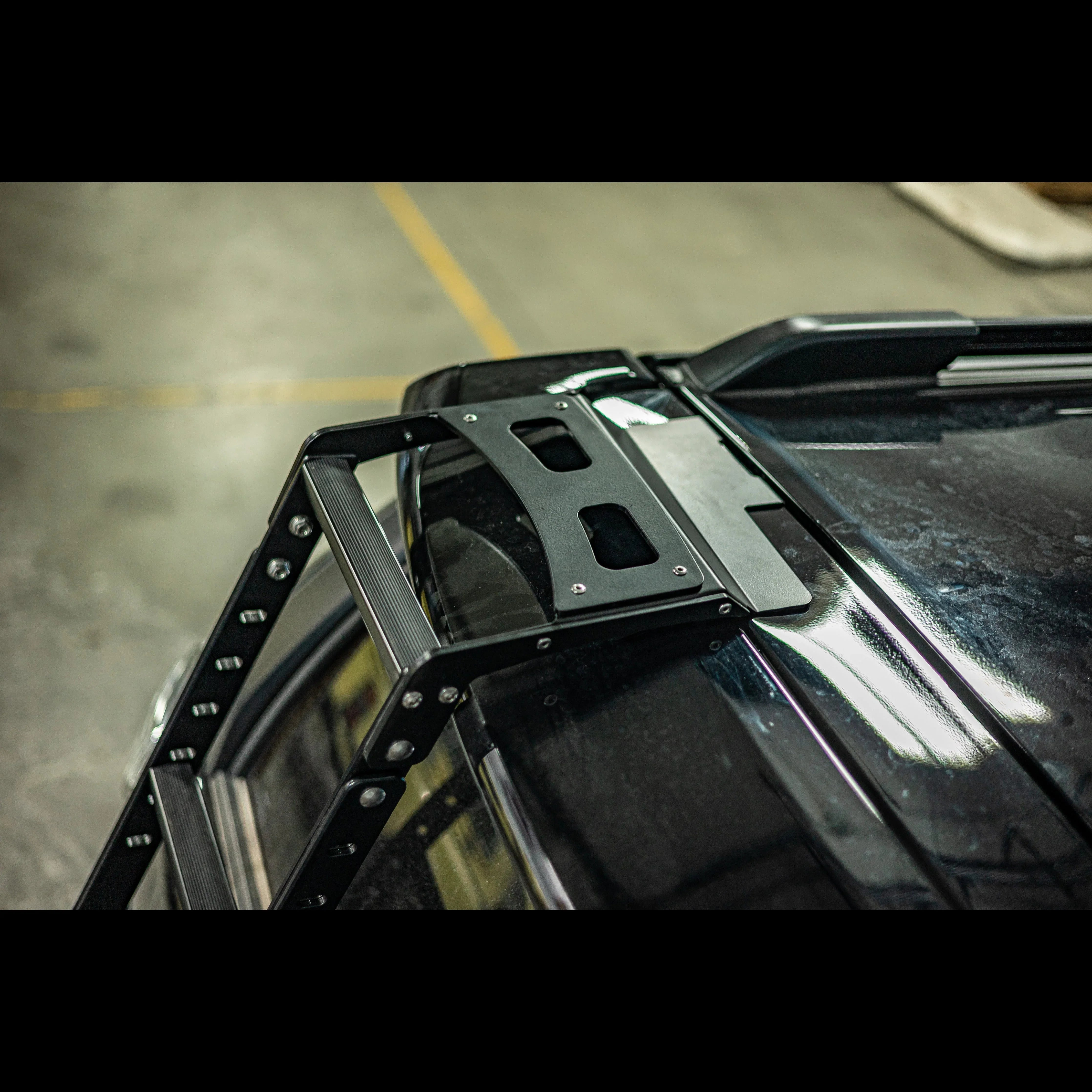 Aluminum hatch ladder mounted on a Toyota 4Runner for overlanding gear access