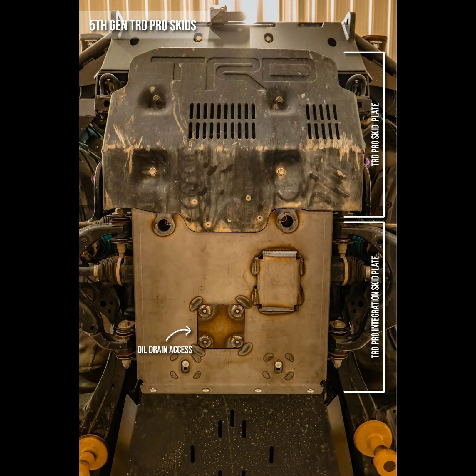 5th gen Toyota 4Runner TRD Pro skid plates with oil drain access installed under vehicle