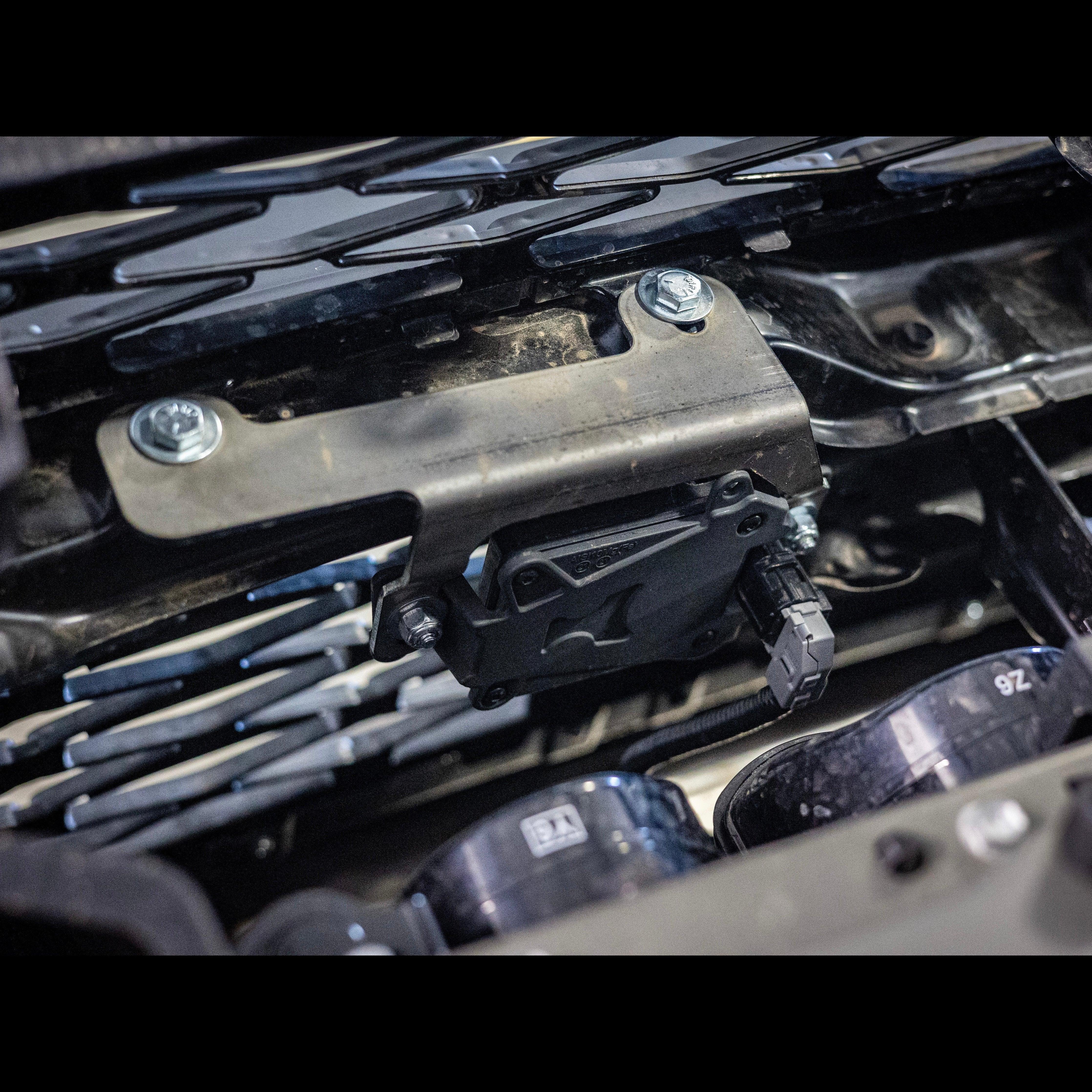 Toyota 4Runner TSS relocation kit installed behind front grille, overland accessory