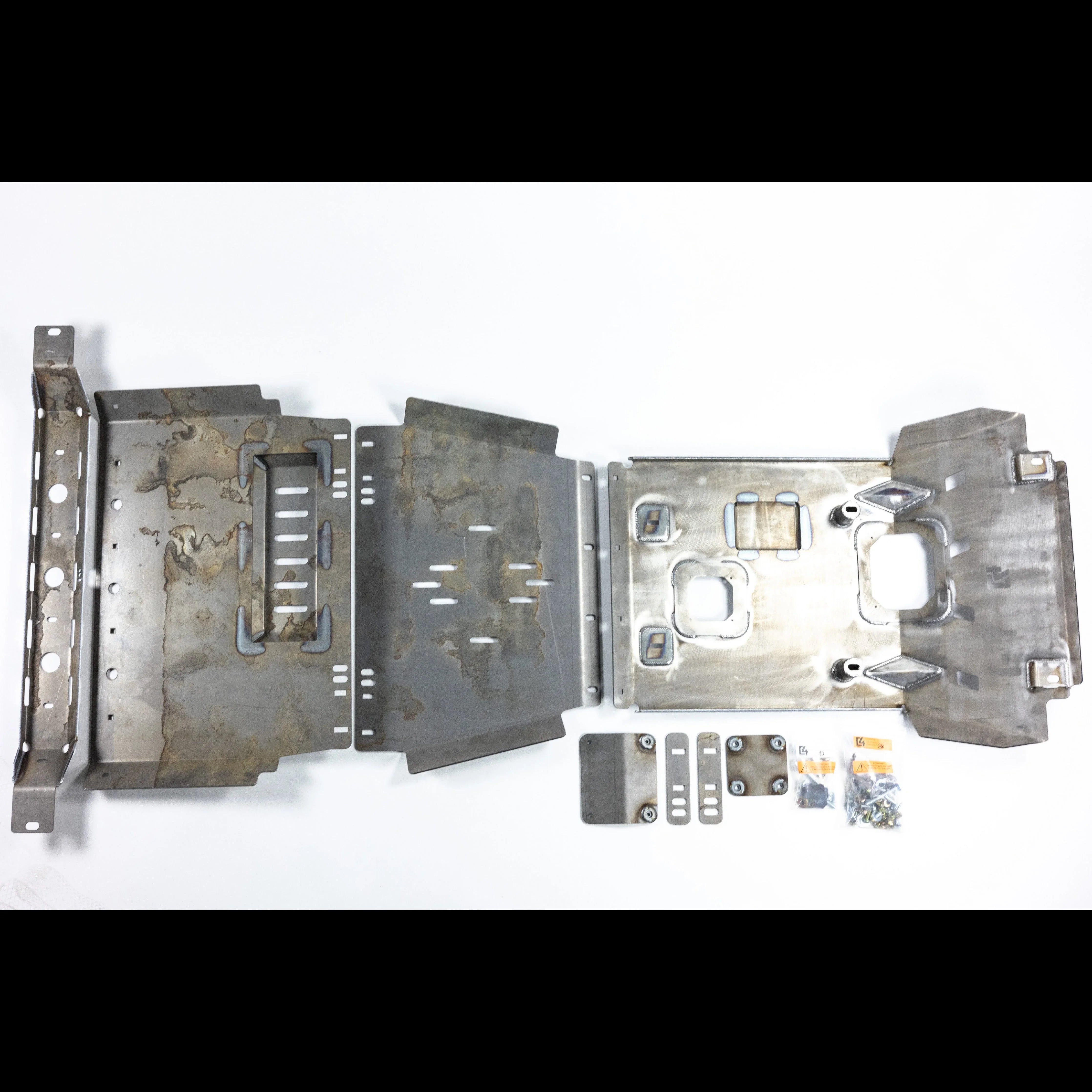 Steel skid plate set with mounting brackets and hardware for off-road vehicles
