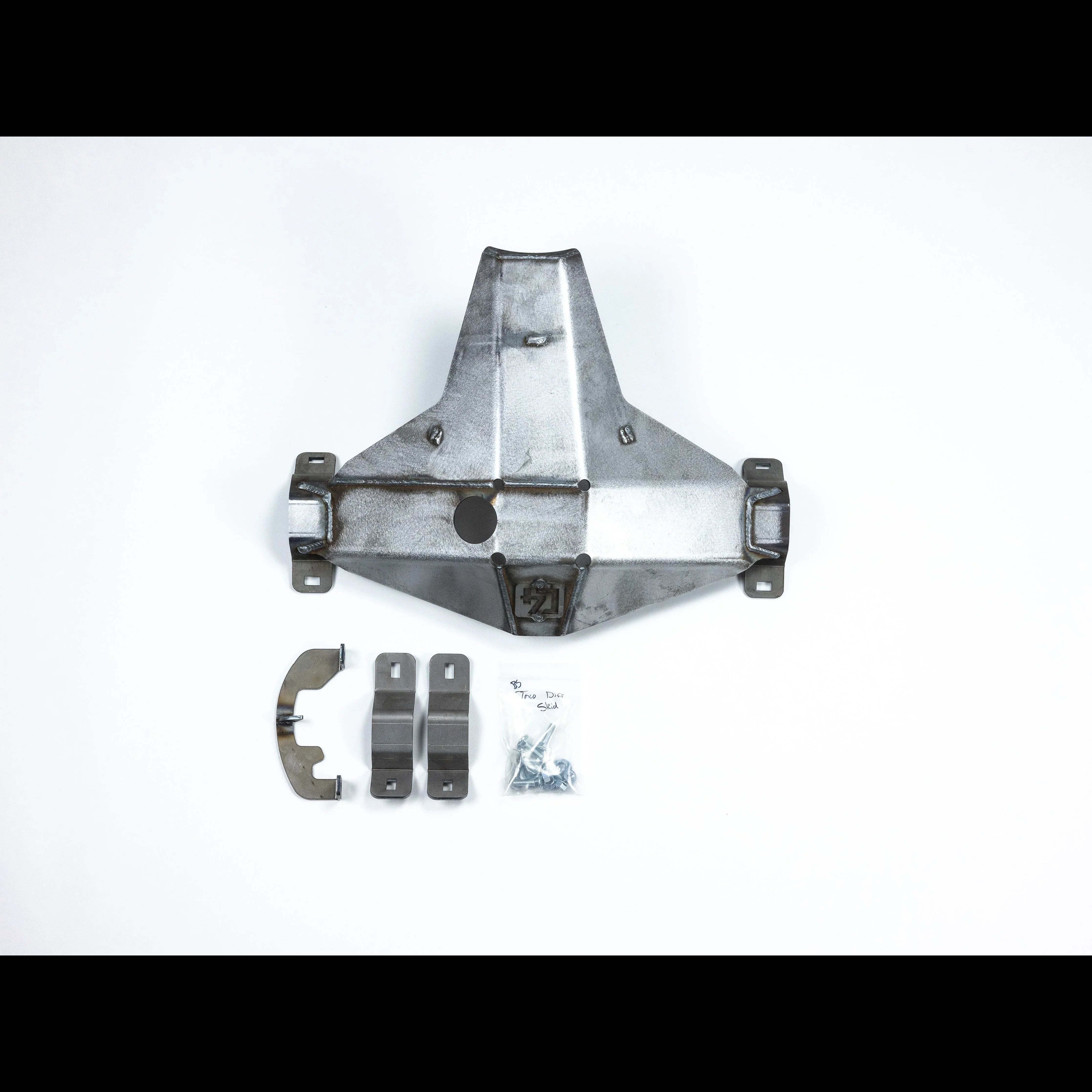 Steel skid plate kit with mounting brackets and bolts for off-road or overlanding vehicles.