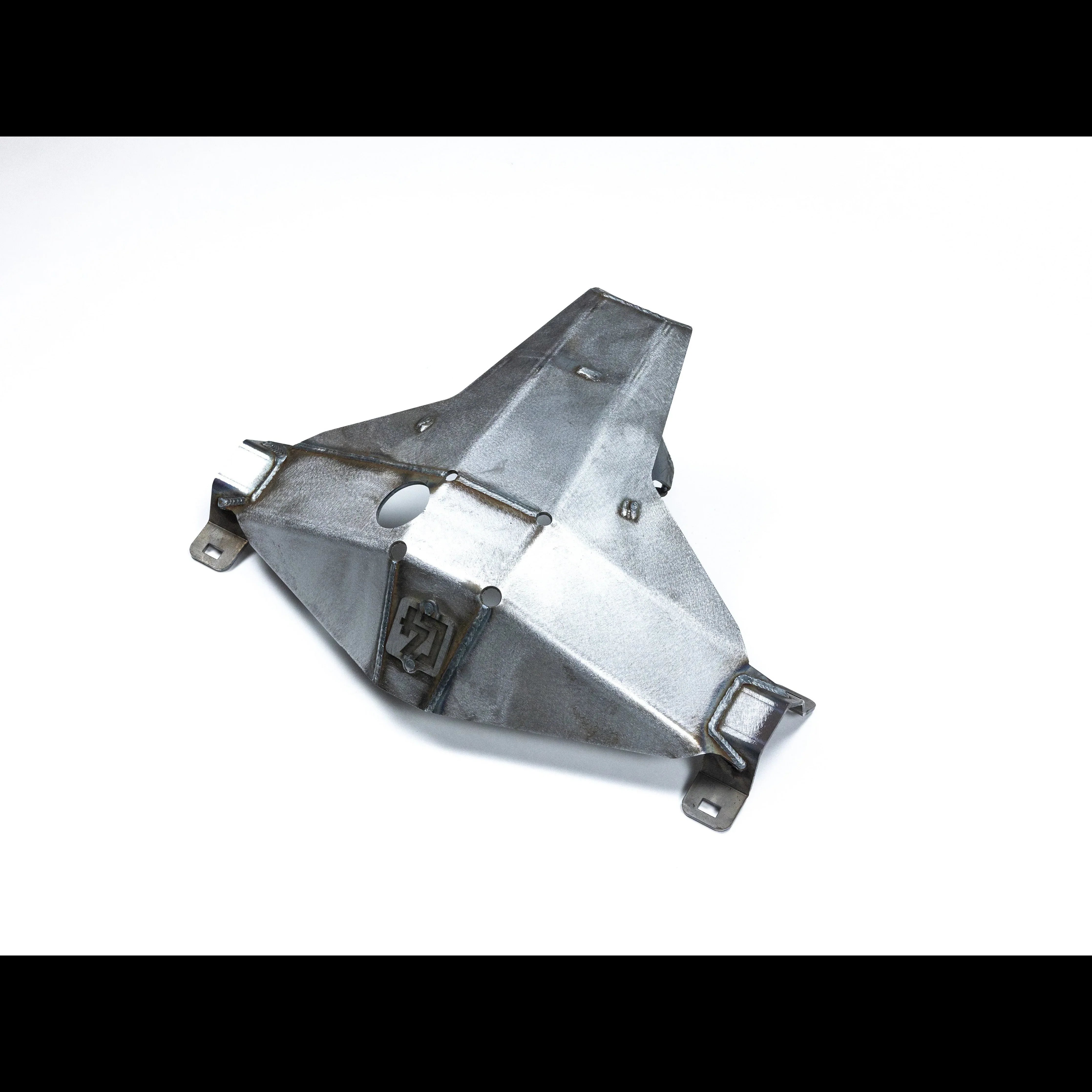 Steel skid plate for off-road vehicle, rugged metal construction on white background