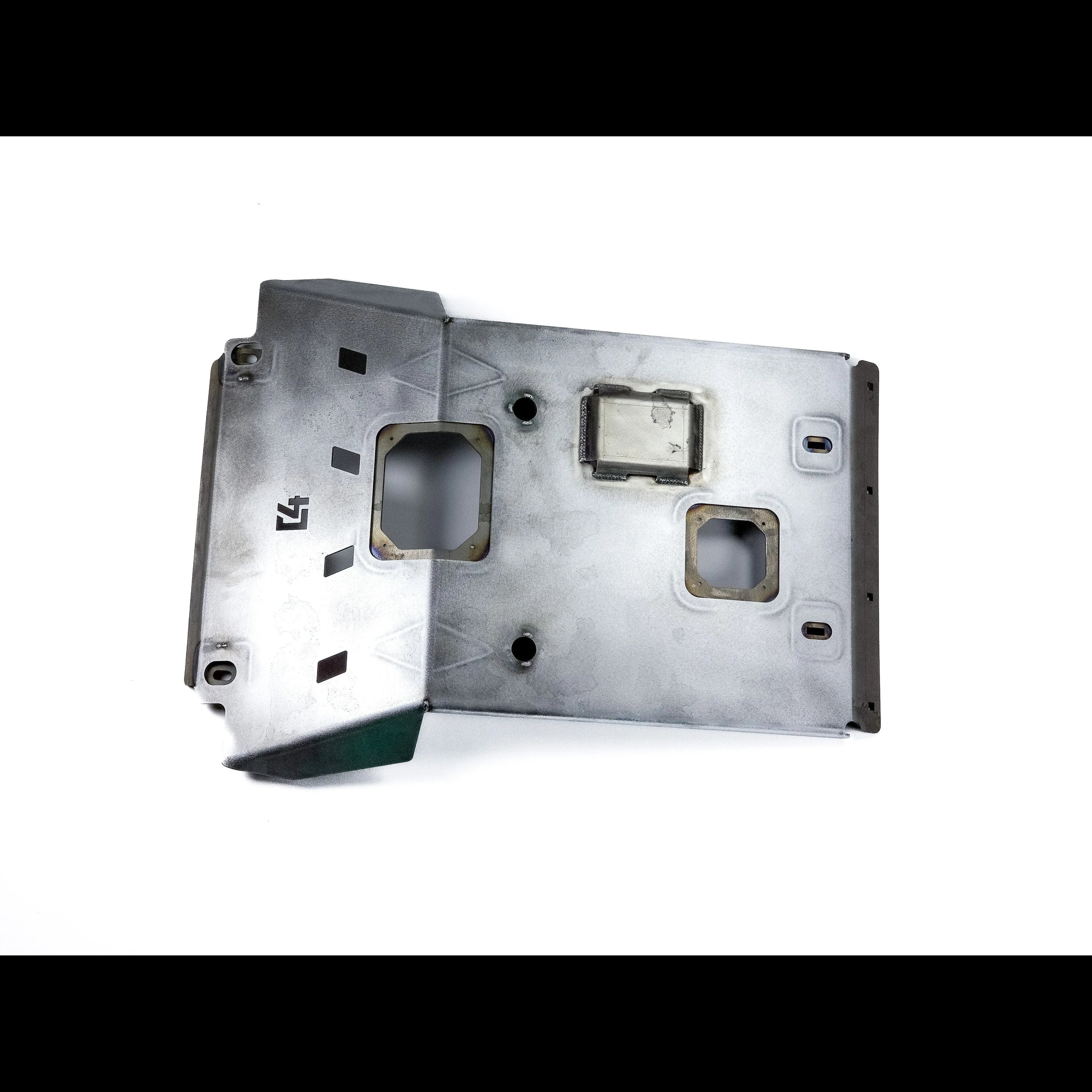 Steel skid plate with cutouts for off-road vehicle undercarriage protection on white background