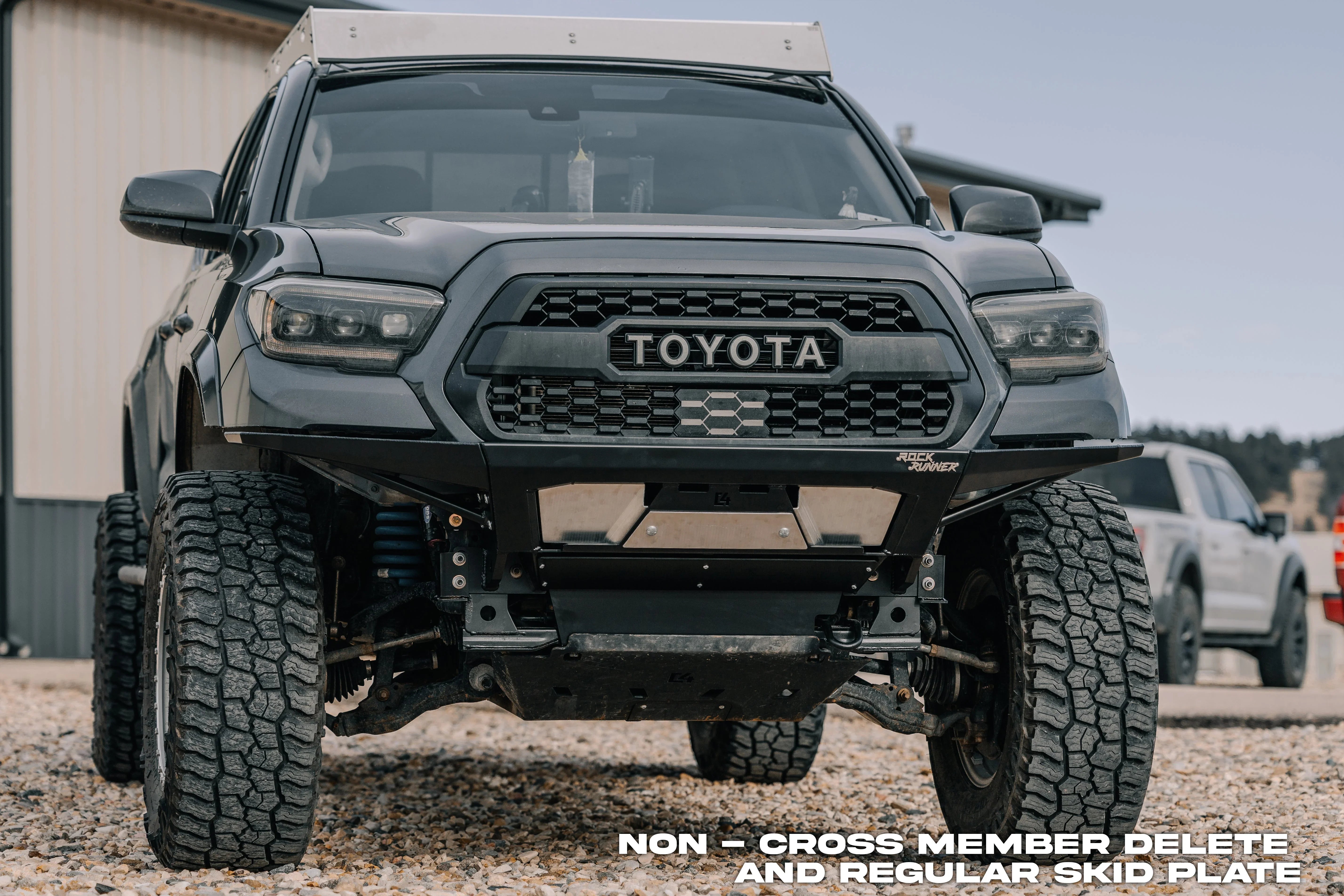 Toyota Tacoma with off-road bumper and skid plate for overlanding and expedition gear