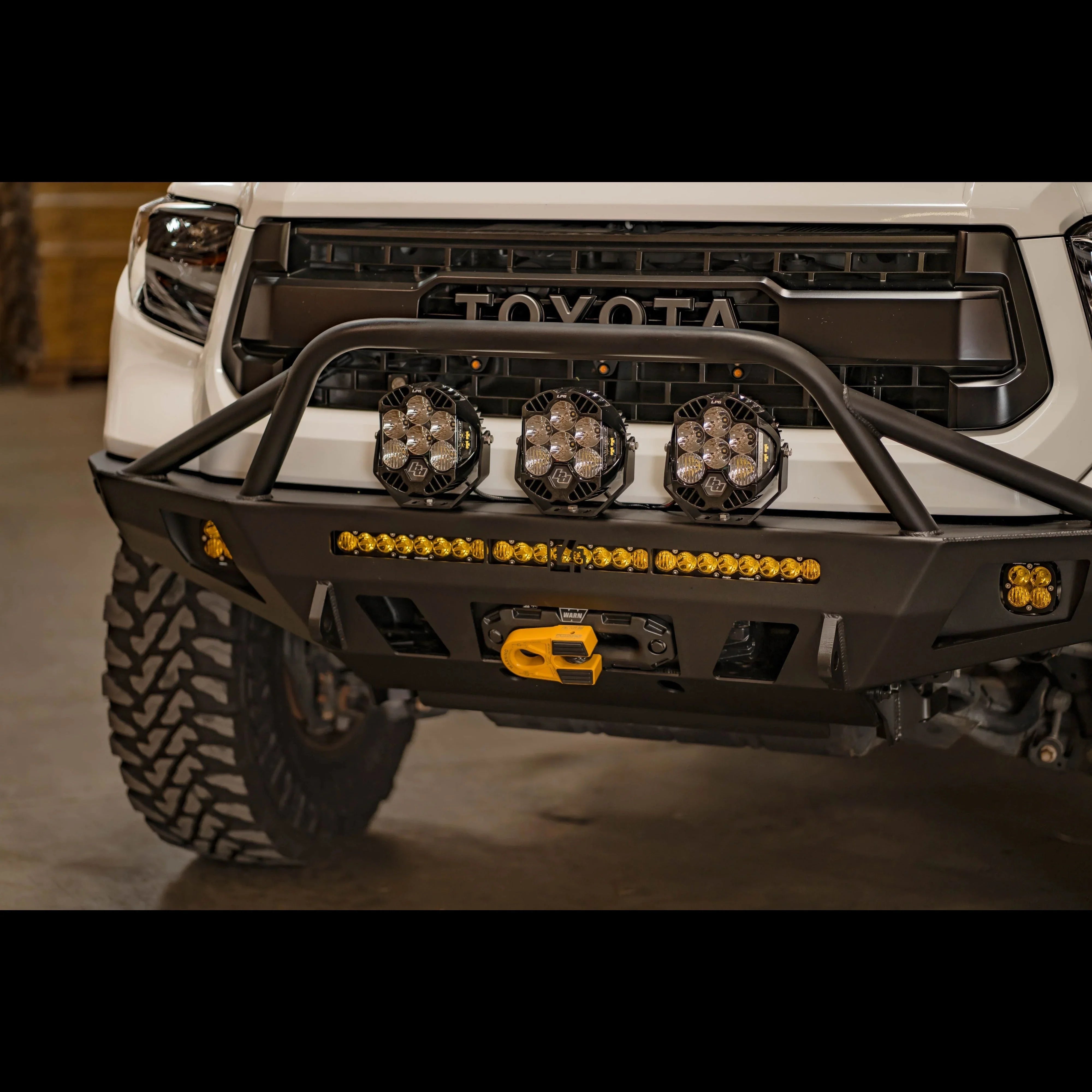 Toyota Tacoma front off-road bumper with LED lights and rugged winch hook