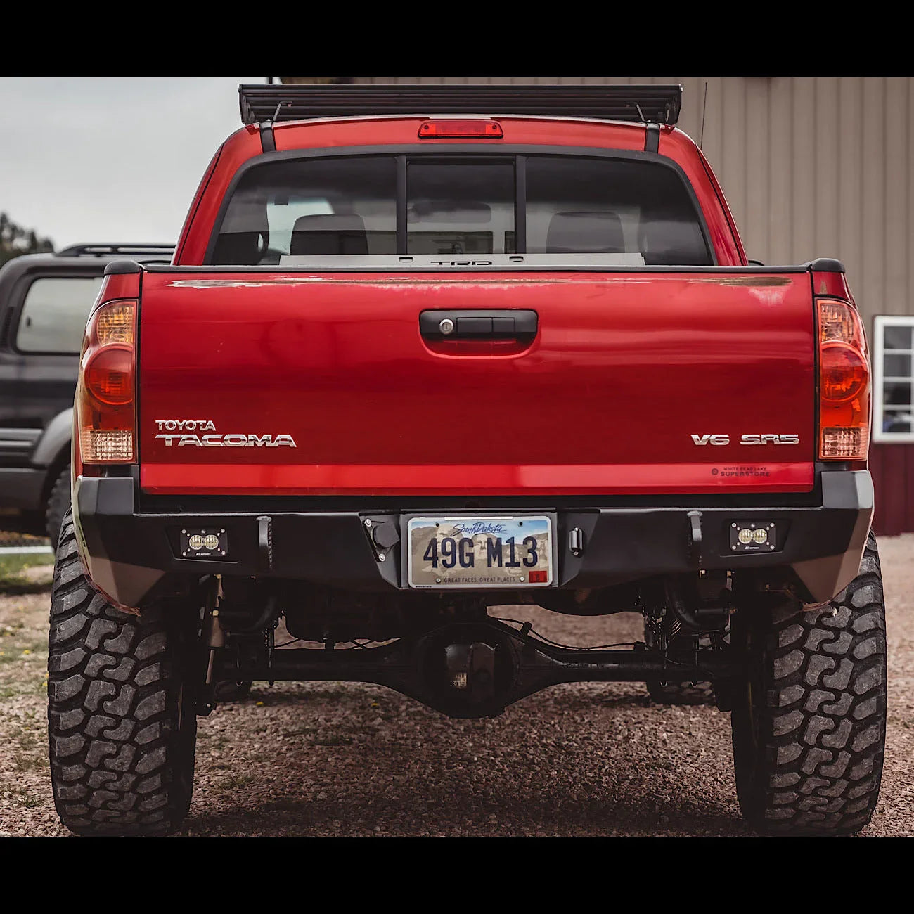 2005-2015 Toyota Tacoma with overland rear bumper, off-road tires, and LED lights