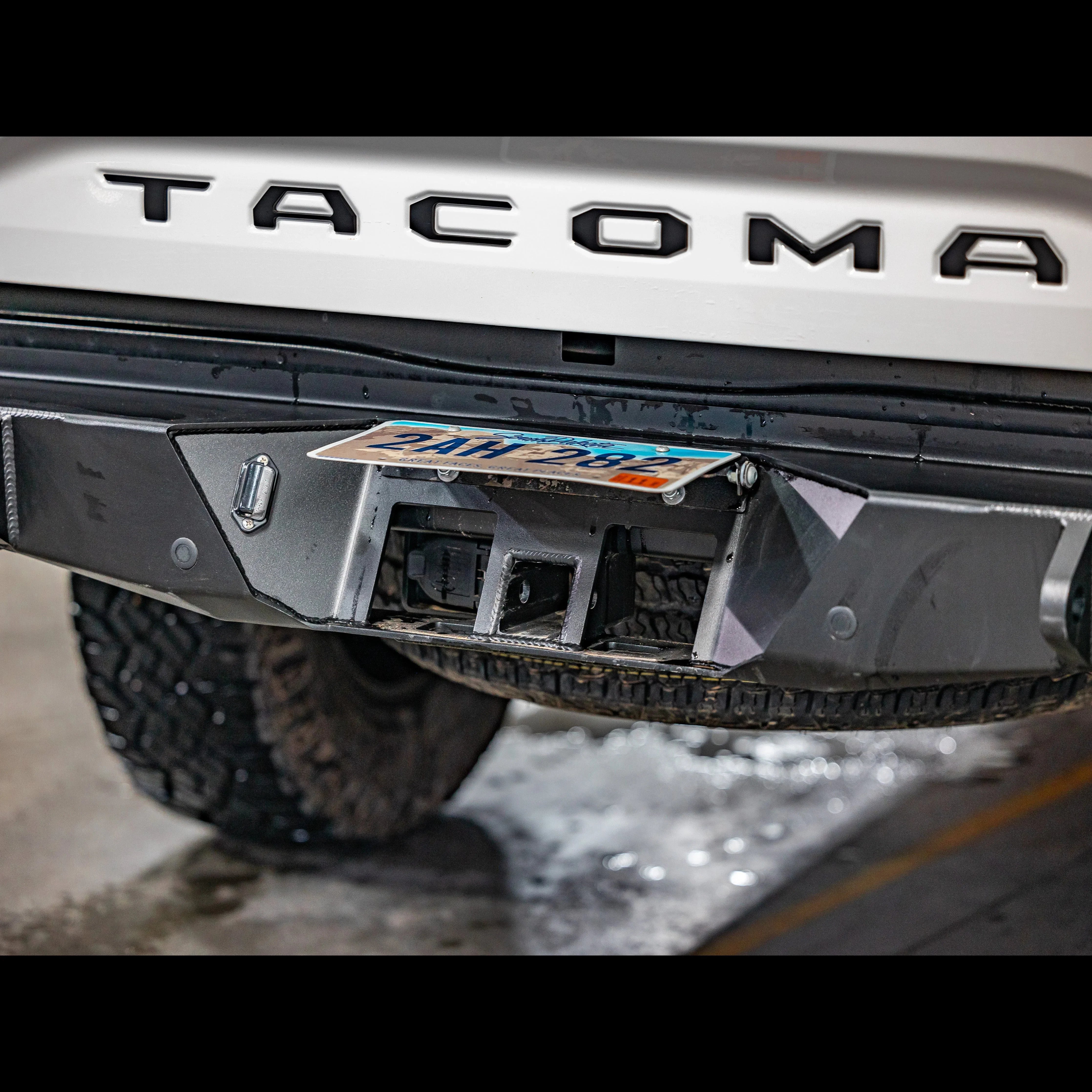 Toyota Tacoma 3rd Gen steel overland rear bumper with license plate and hitch receiver