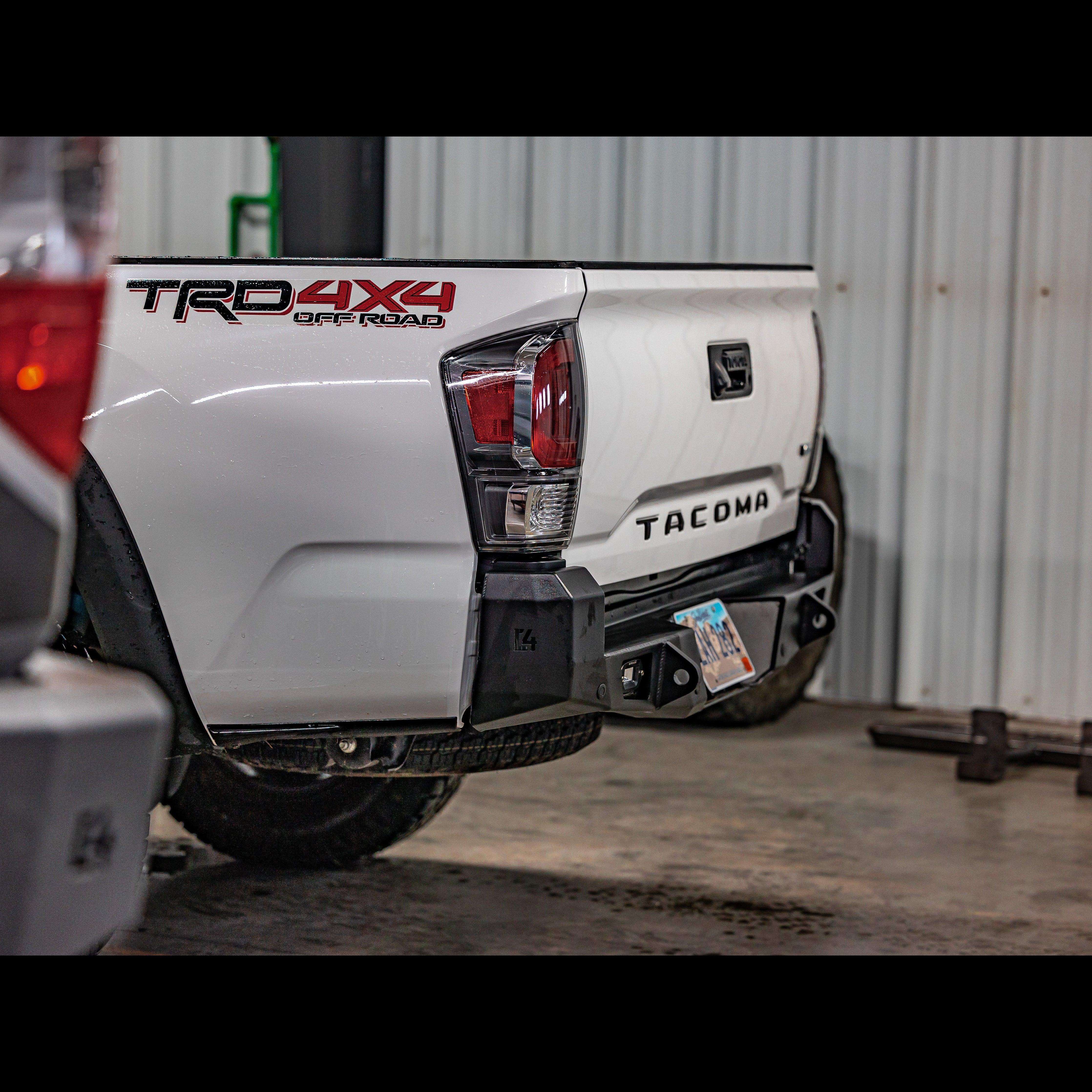 Rear view of Toyota Tacoma TRD 4x4 with overland steel off-road rear bumper