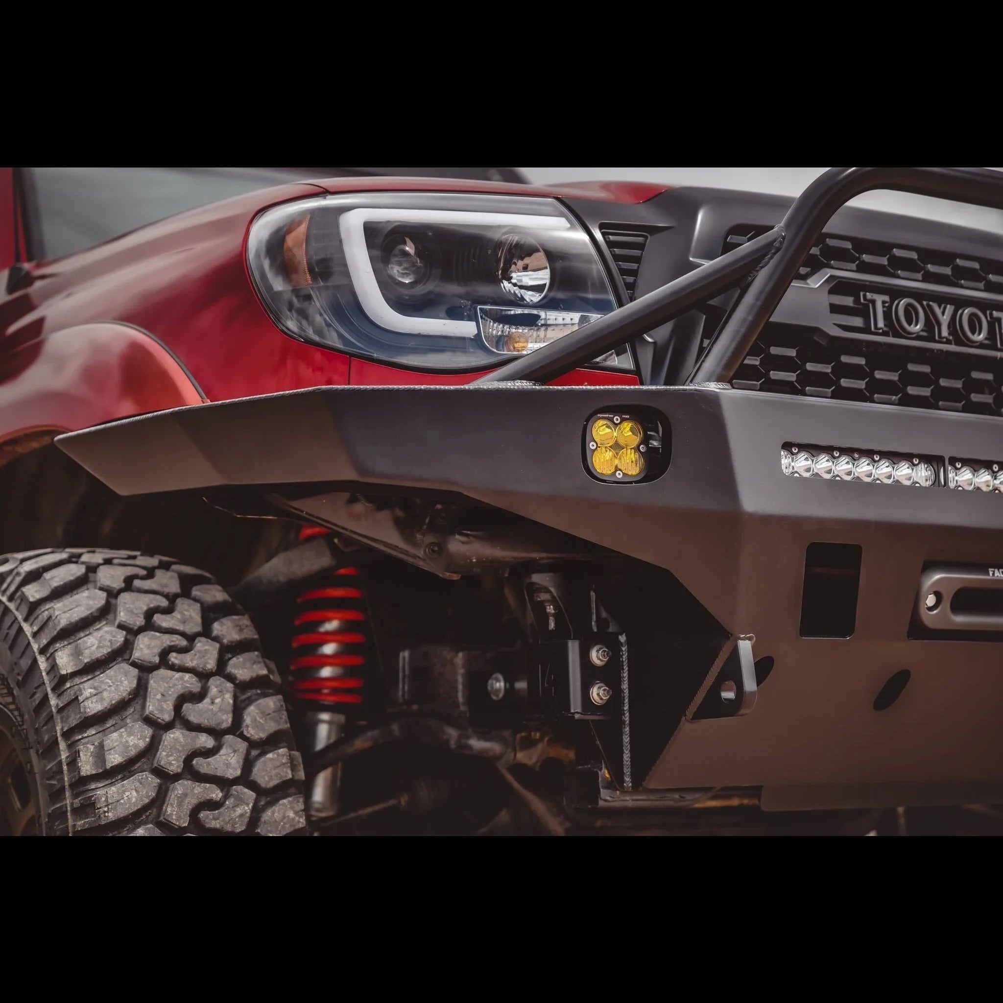 Toyota Tacoma 2nd Gen overland front bumper with LED lights and off-road tire