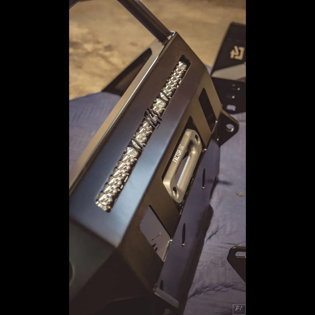 Tacoma overland series front bumper with integrated LED light bar and recovery points