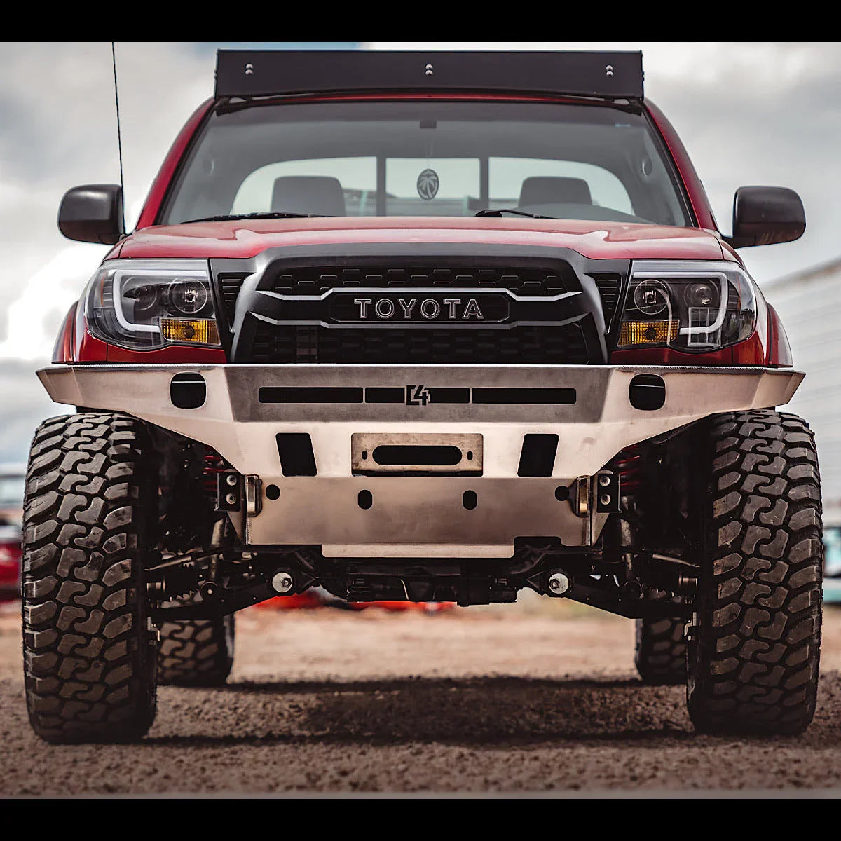 Steel front overland bumper on Toyota Tacoma 2nd Gen, rugged off-road setup