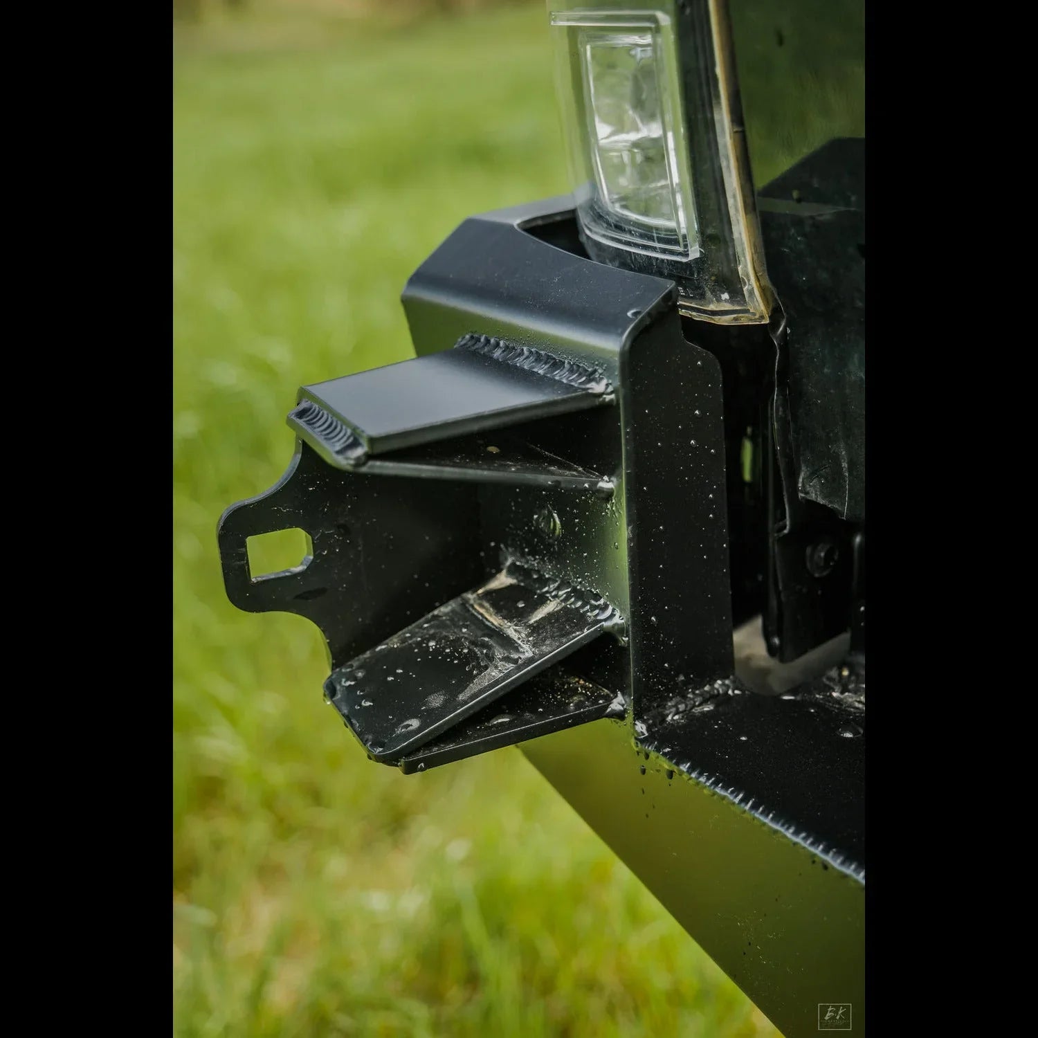 Close-up of a high clearance steel rear bumper on a Toyota Tacoma outdoors