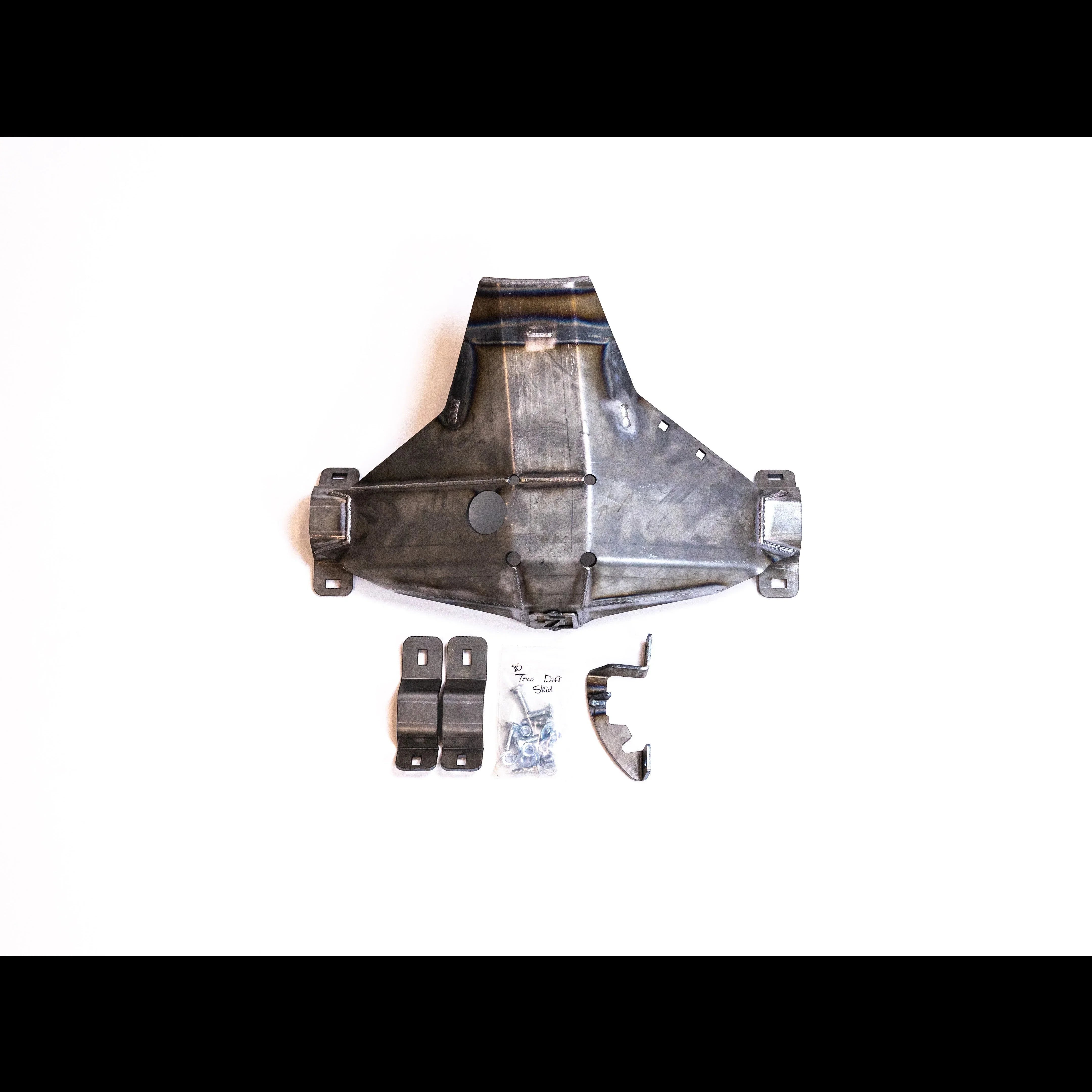 Toyota Tacoma rear differential skid plate with mounting hardware on white background