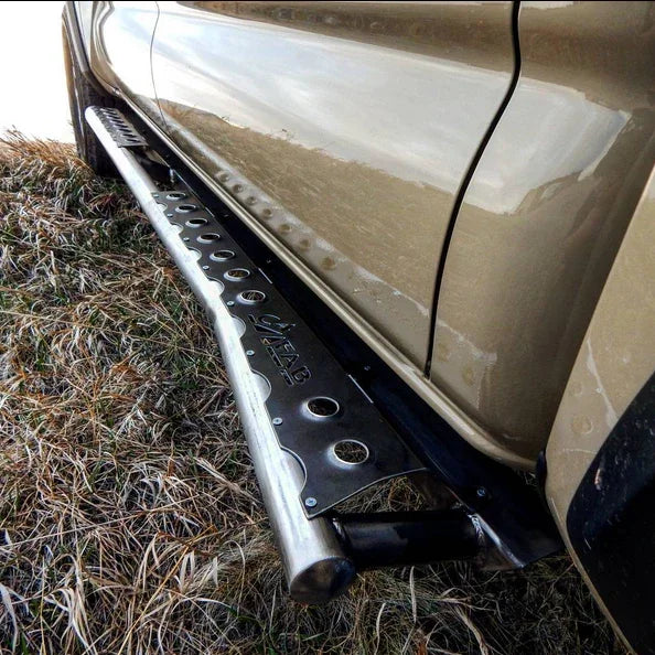 Steel rock slider step mounted on off-road vehicle, close view, aftermarket accessory.