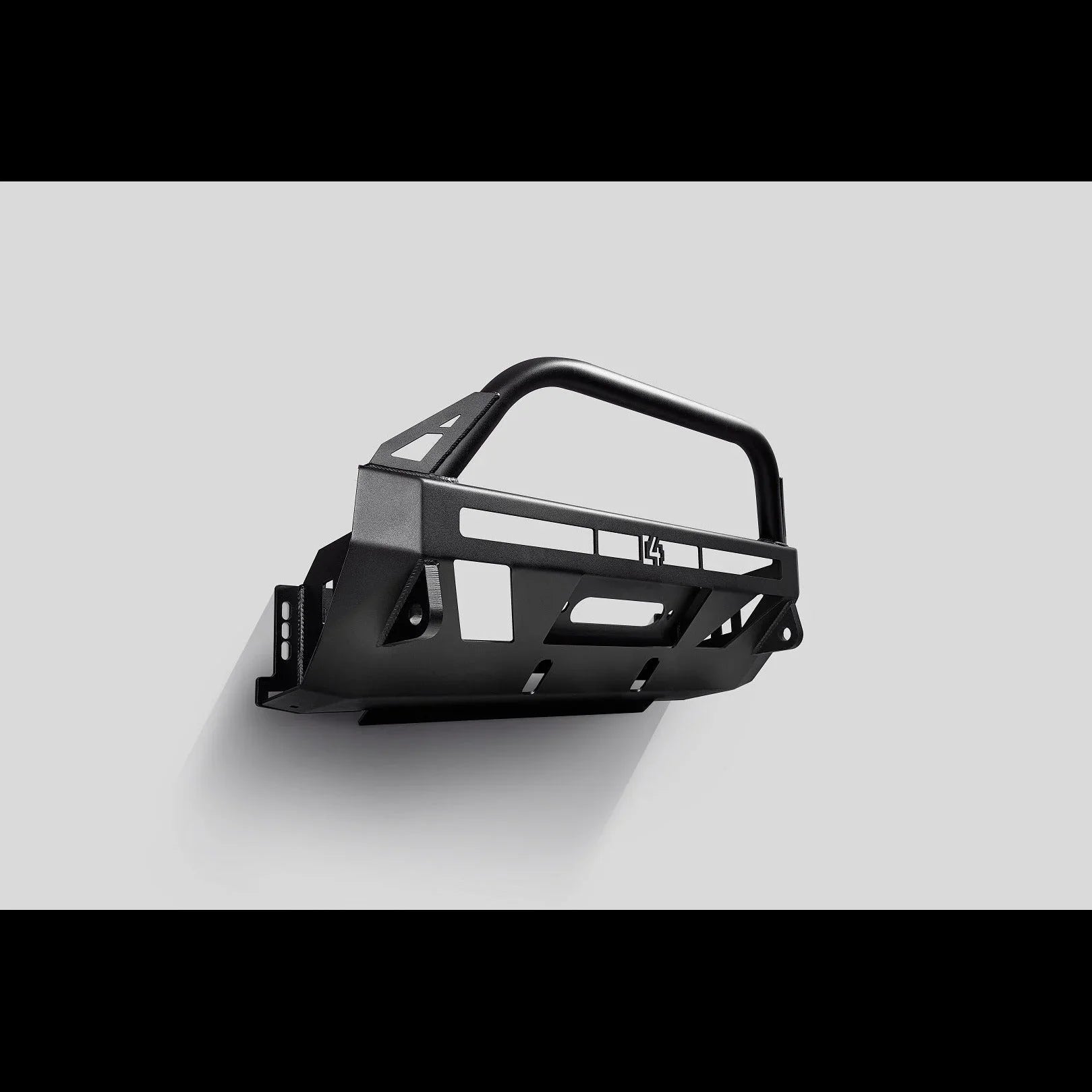 Black steel off-road front bumper with grille guard for trucks and SUVs on gray background