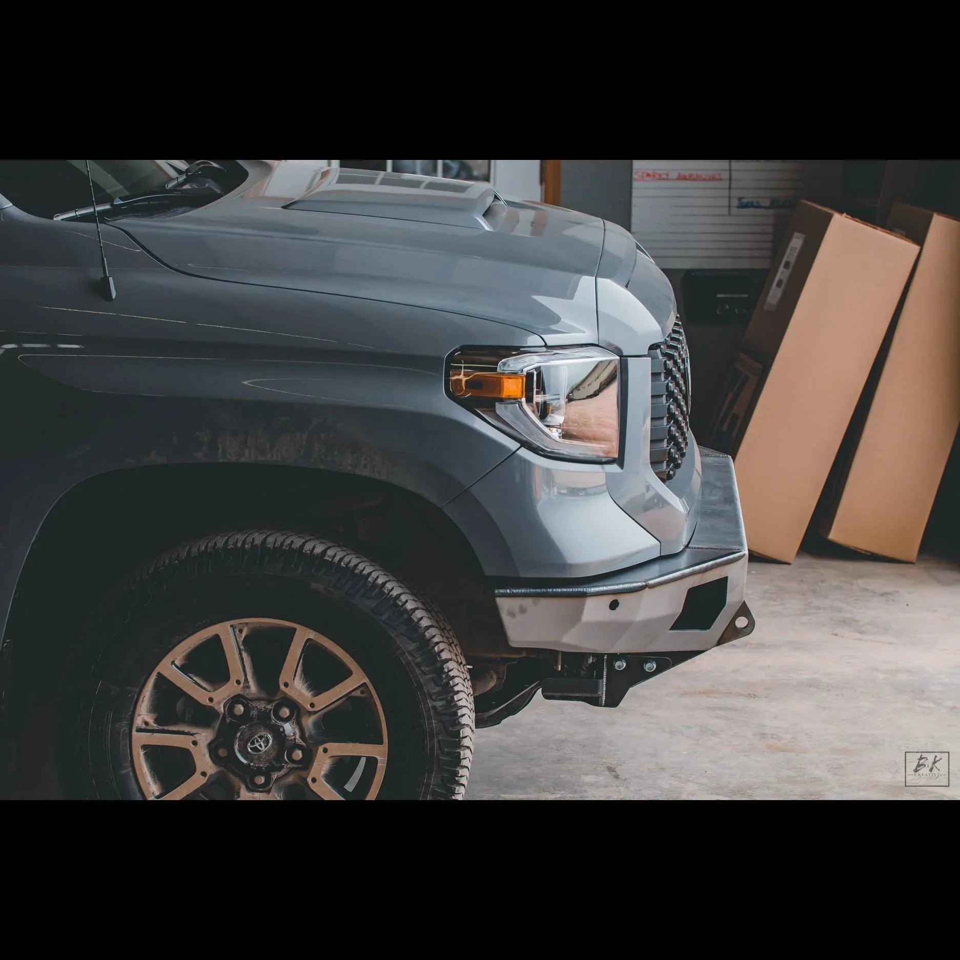 Toyota Tundra front bumper upgrade for overlanding, grey truck in garage