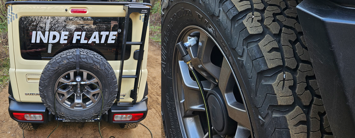Inde Flate tire deflator connected to an off-road tire on a trail
