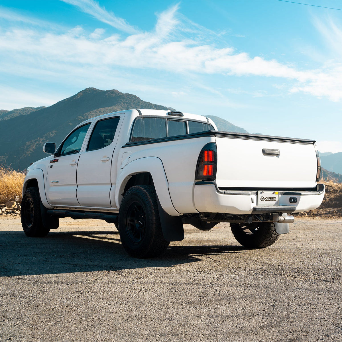 AlphaRex NOVA-Series Prismatic LED Tail Lights for Toyota Tacoma - Black Clear