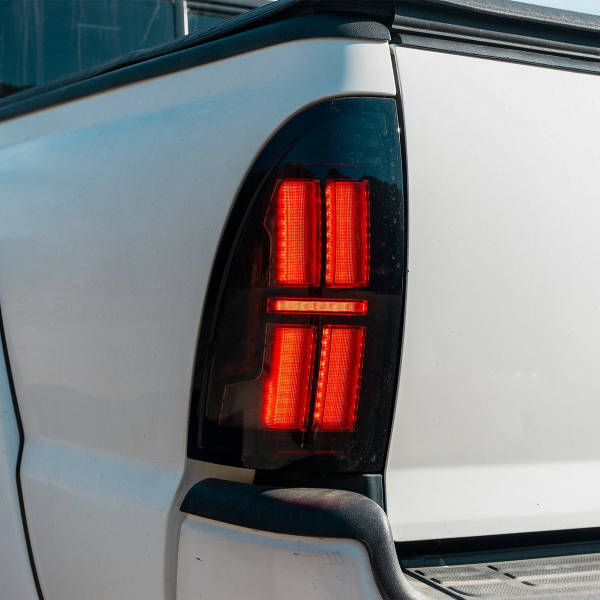 AlphaRex NOVA-Series Prismatic LED Tail Lights for Toyota Tacoma - Black Clear