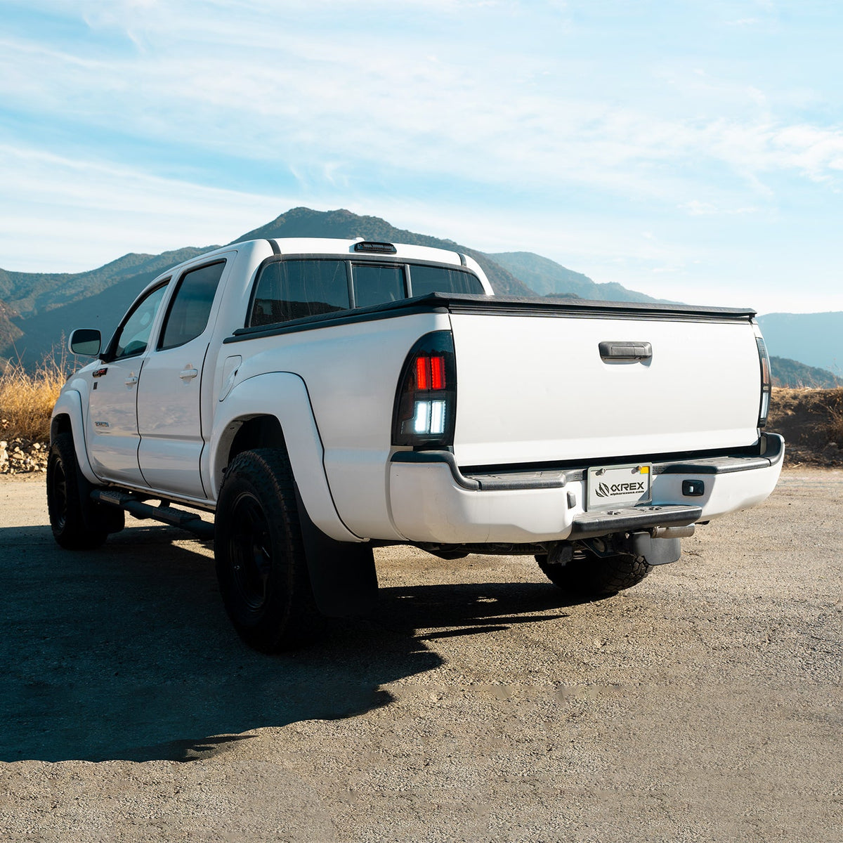 AlphaRex NOVA-Series Prismatic LED Tail Lights for Toyota Tacoma - Black Clear