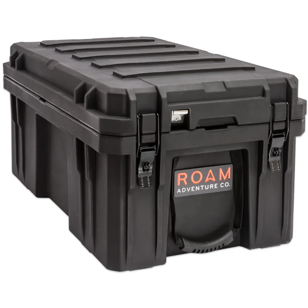 Black heavy-duty overland storage box with secure latches and ROAM Adventure Co. logo
