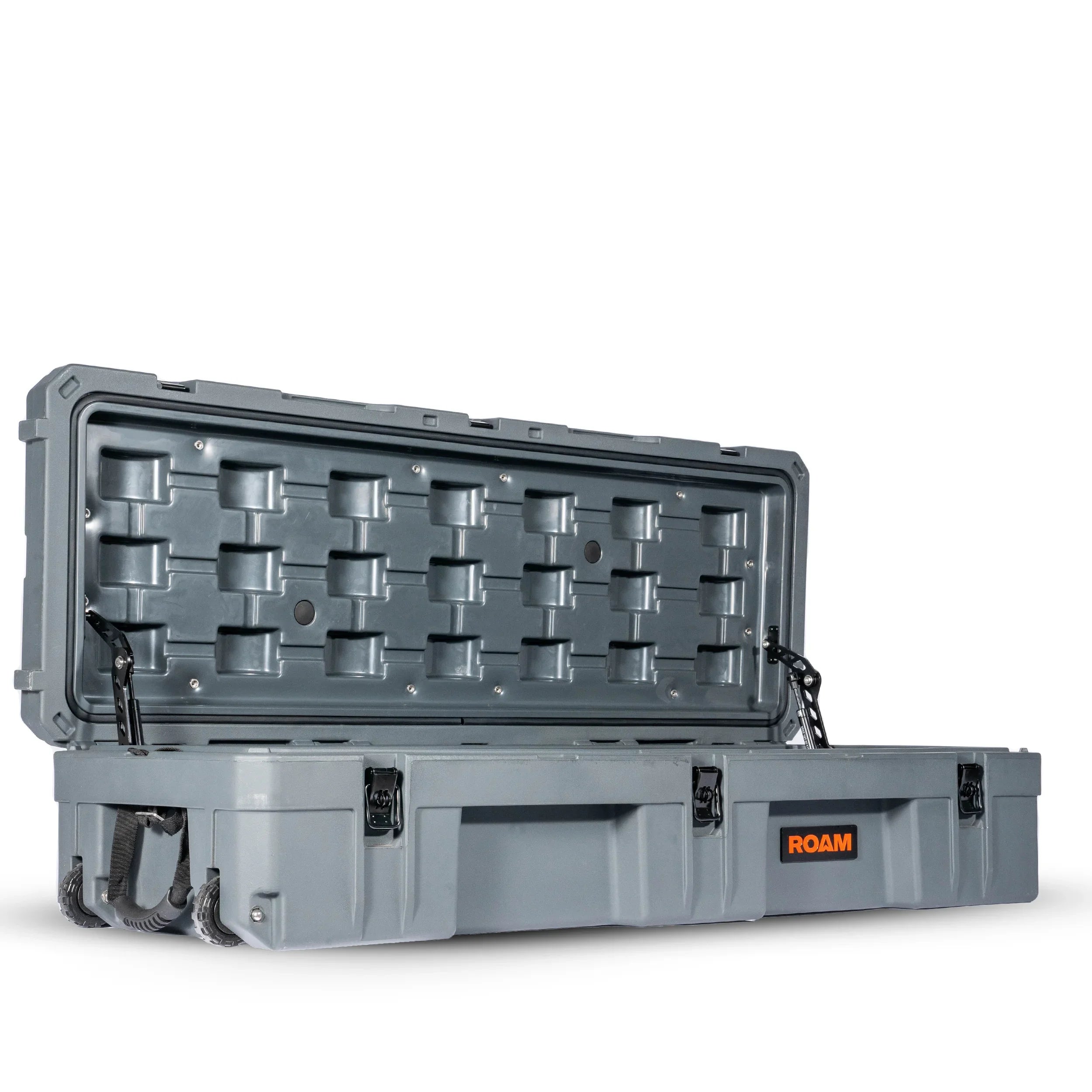 Gray hard-shell overland storage case with open lid and latches, designed for expedition gear