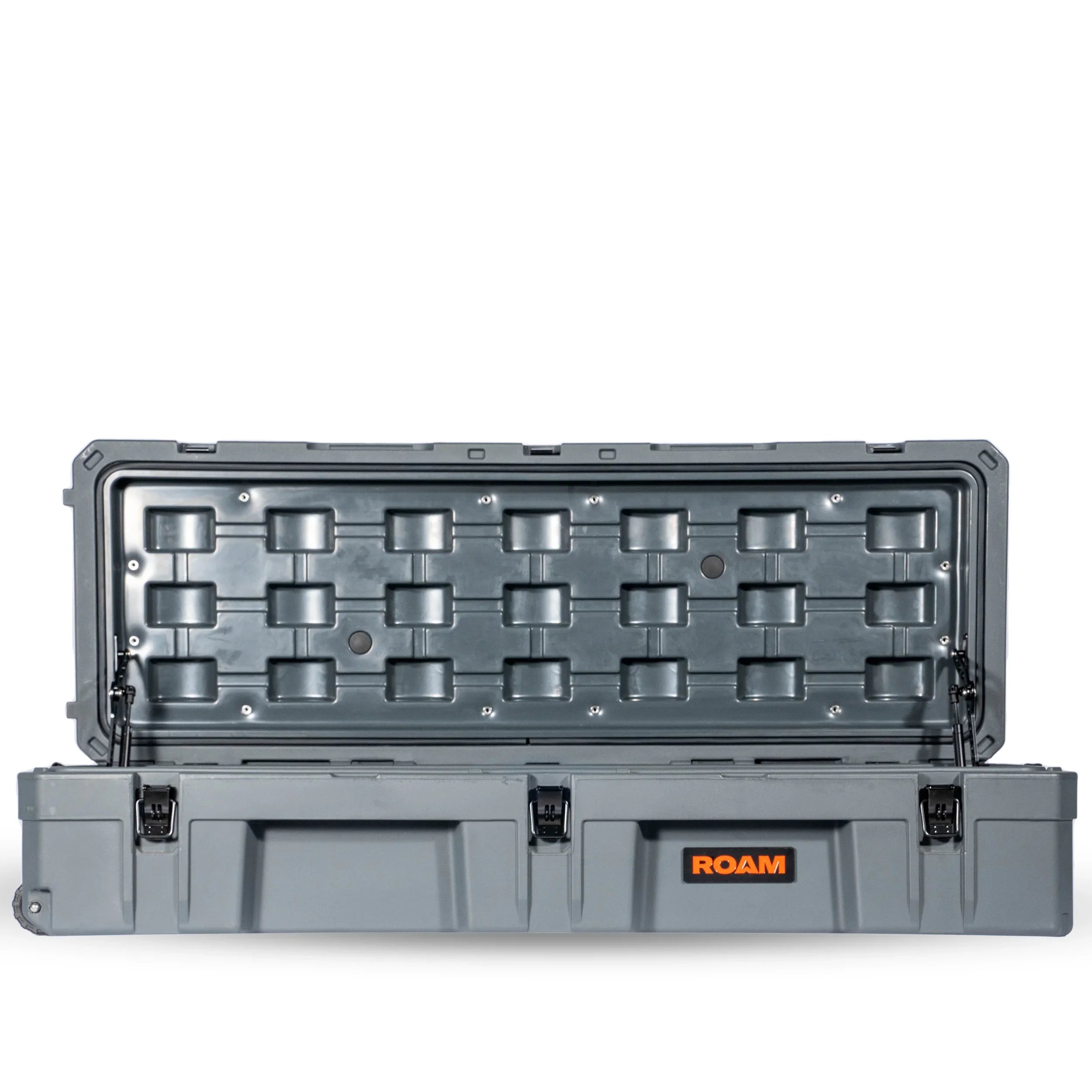 Open gray hard storage case with secure latches for overlanding and camping gear