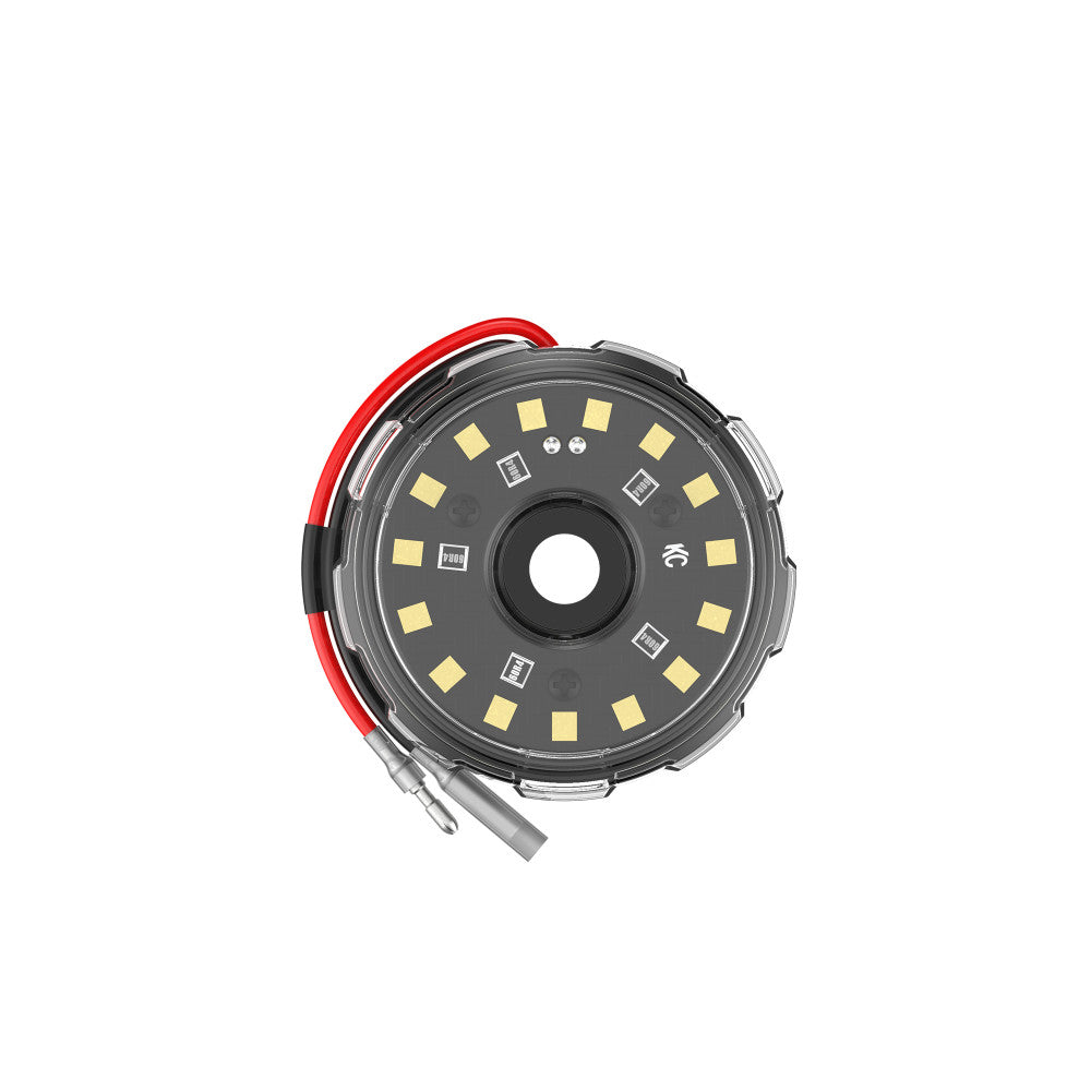Round LED light module with exposed wiring, suitable for off-road or expedition vehicle use