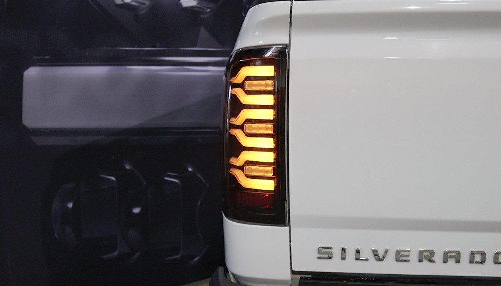 AlphaRex LUXX-Series LED Tail Lights for Chevrolet Silverado 1500 / Chevrolet Silverado HD 2500/3500 - Black Red