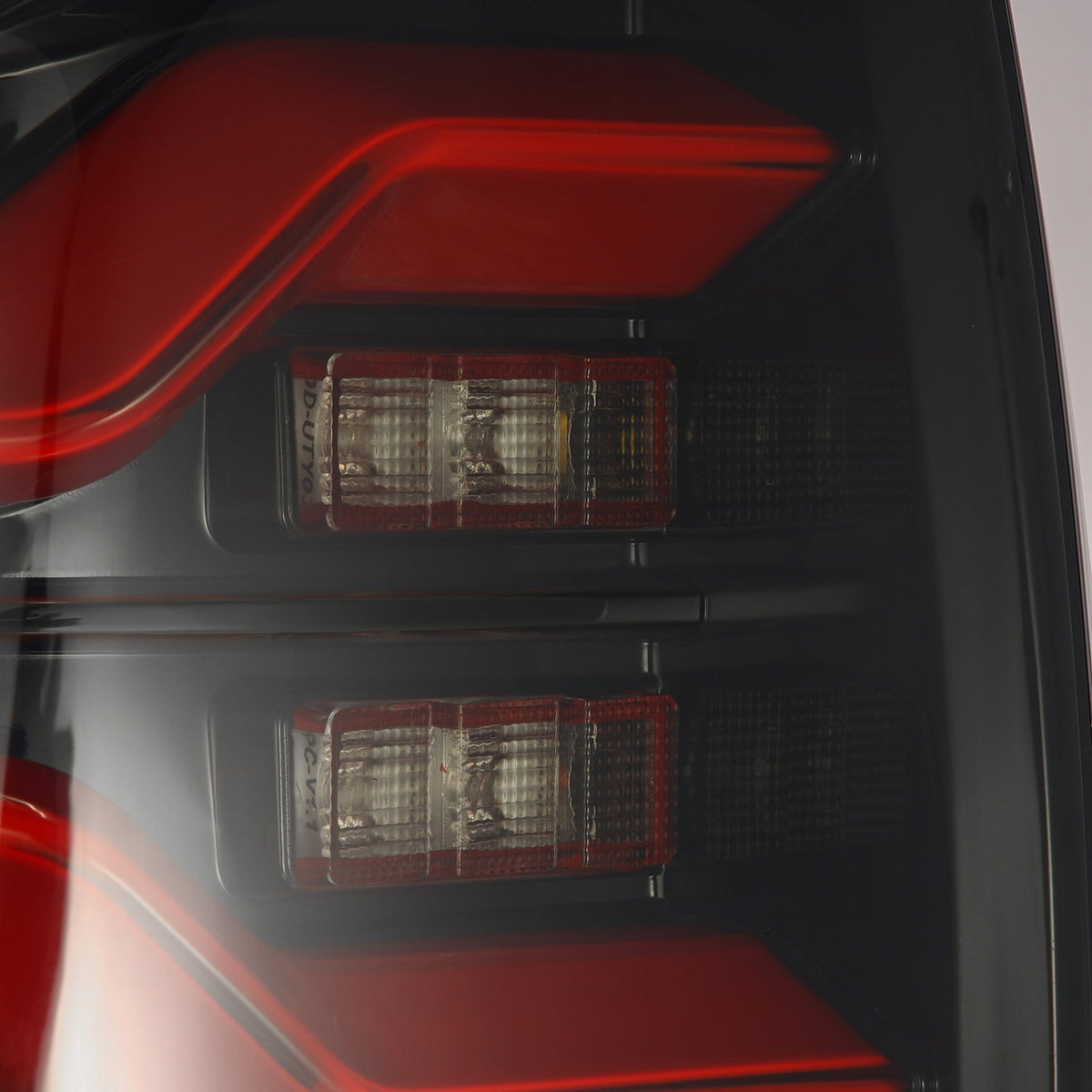 AlphaRex LUXX-Series LED Tail Lights for Toyota Tacoma - Black Red