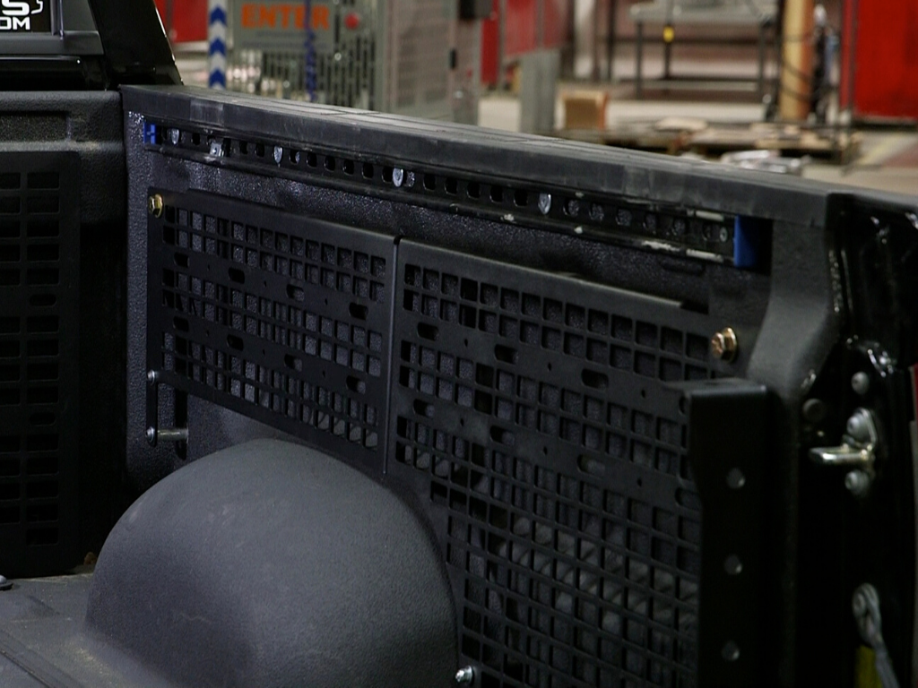 Truck bed molle panel storage system mounted for overlanding gear organization