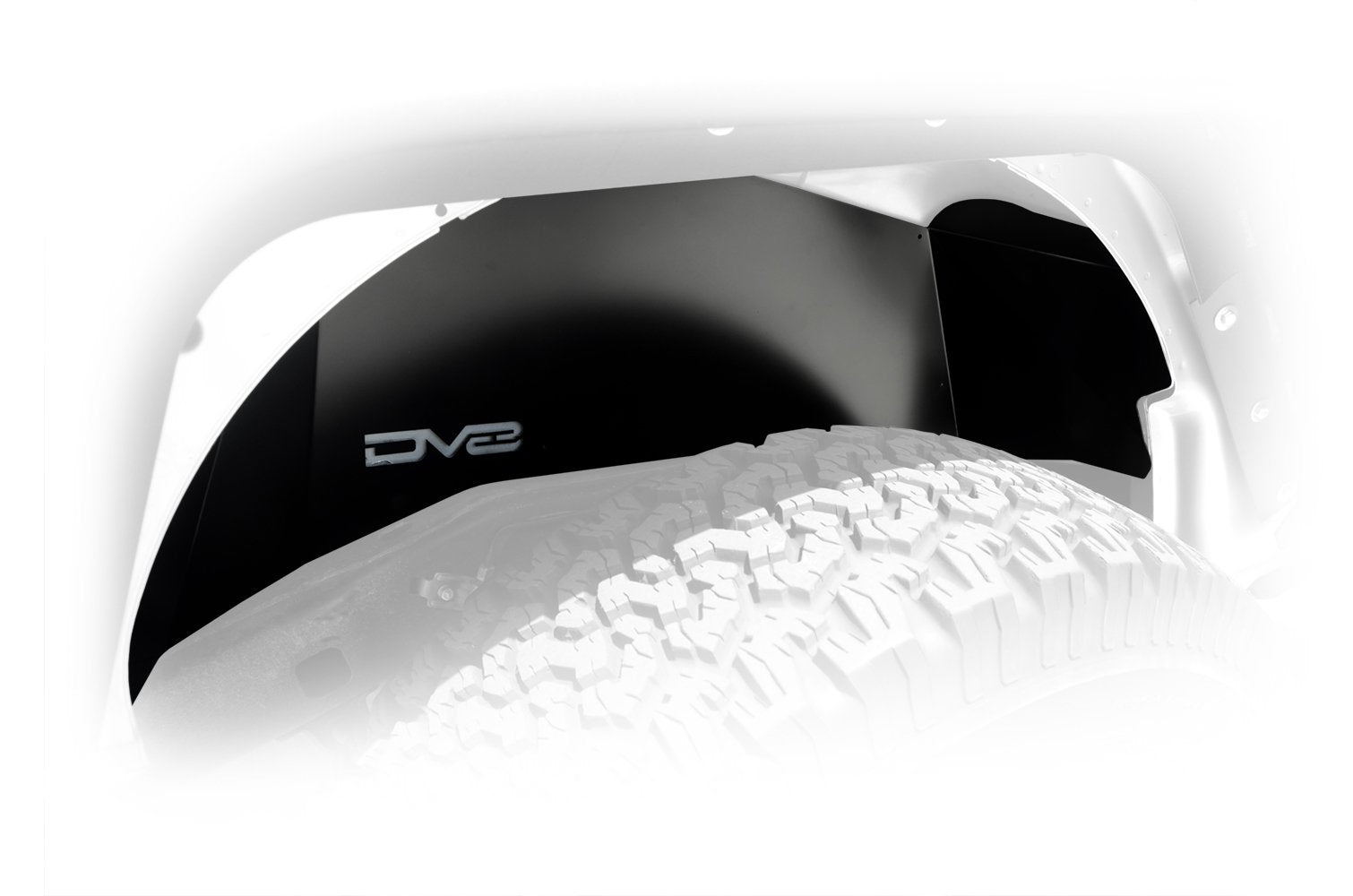 Black rear inner fender for Jeep Wrangler JK above off-road tire, DV8 logo visible.